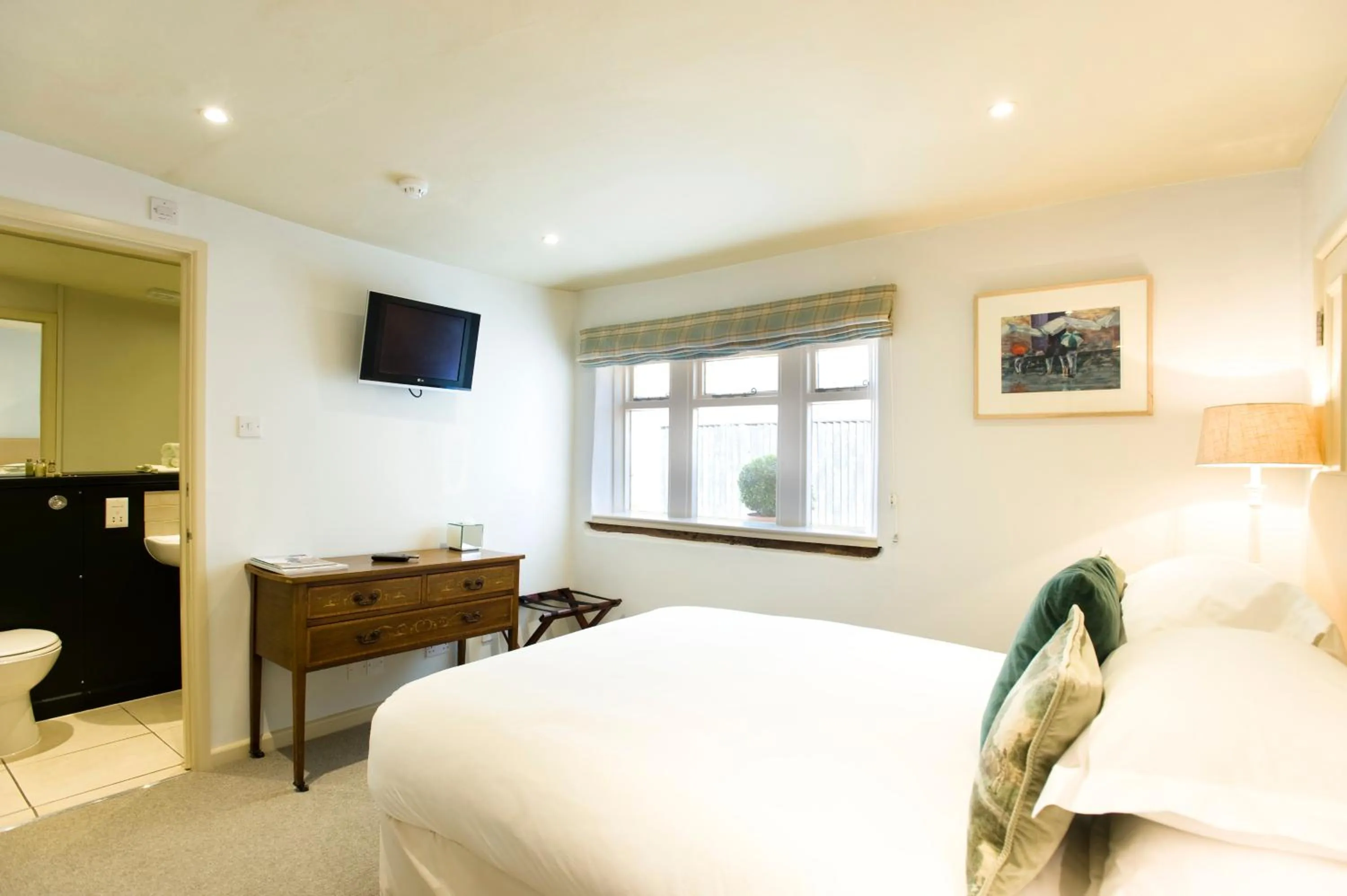 Bed in The Greyhound on the Test Hotel