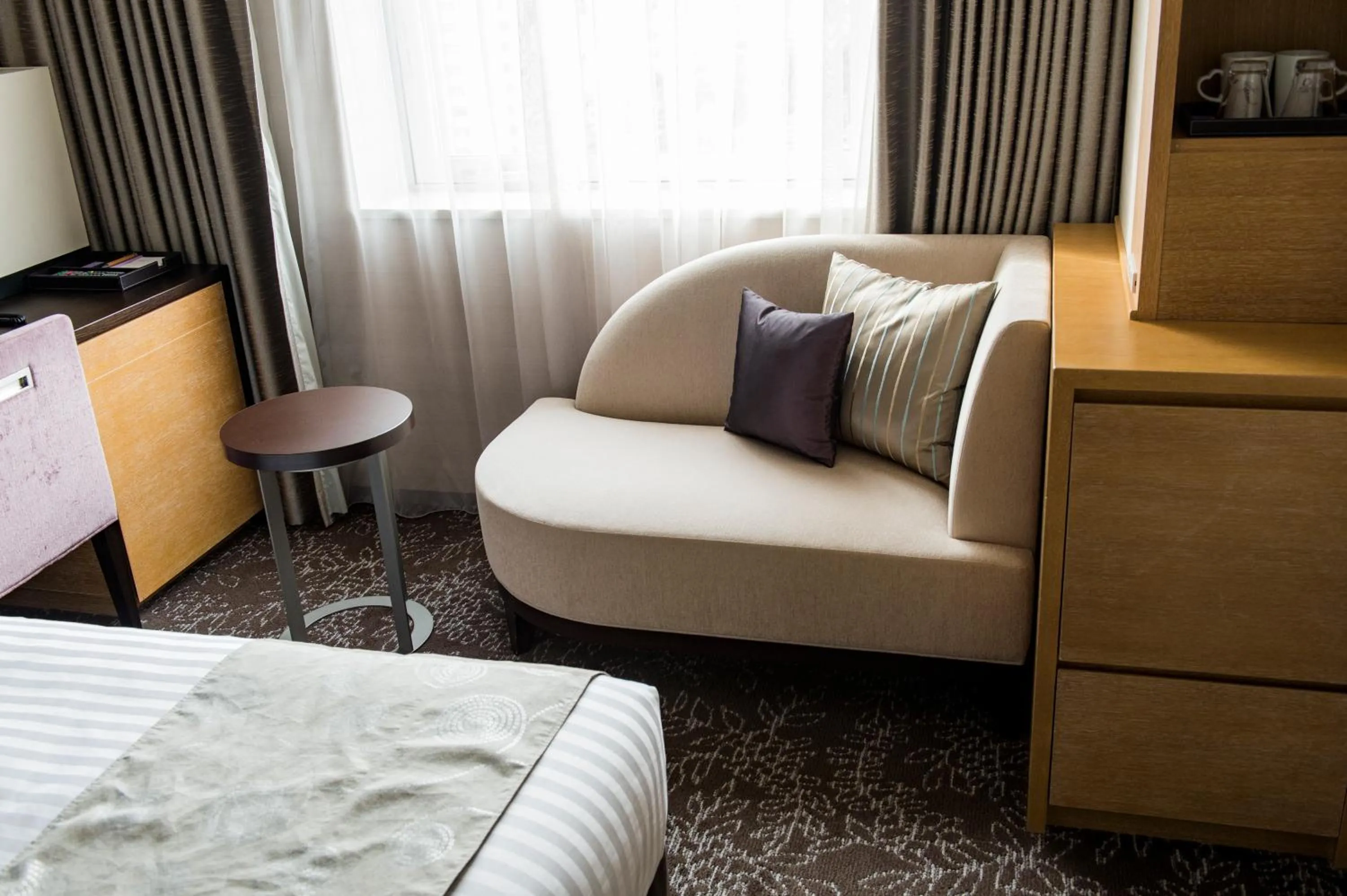 Seating area, Bed in Hotel Ole