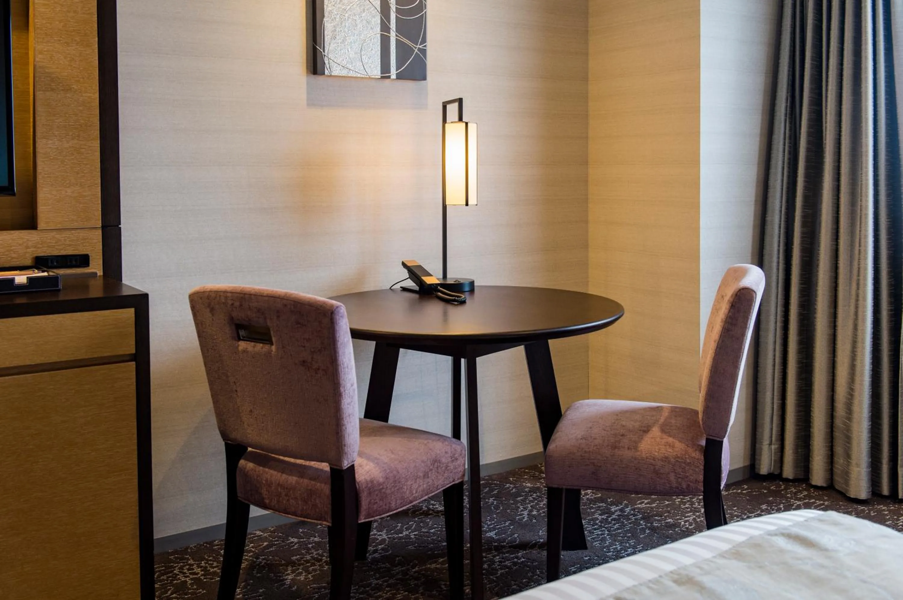 Seating area, Bed in Hotel Ole