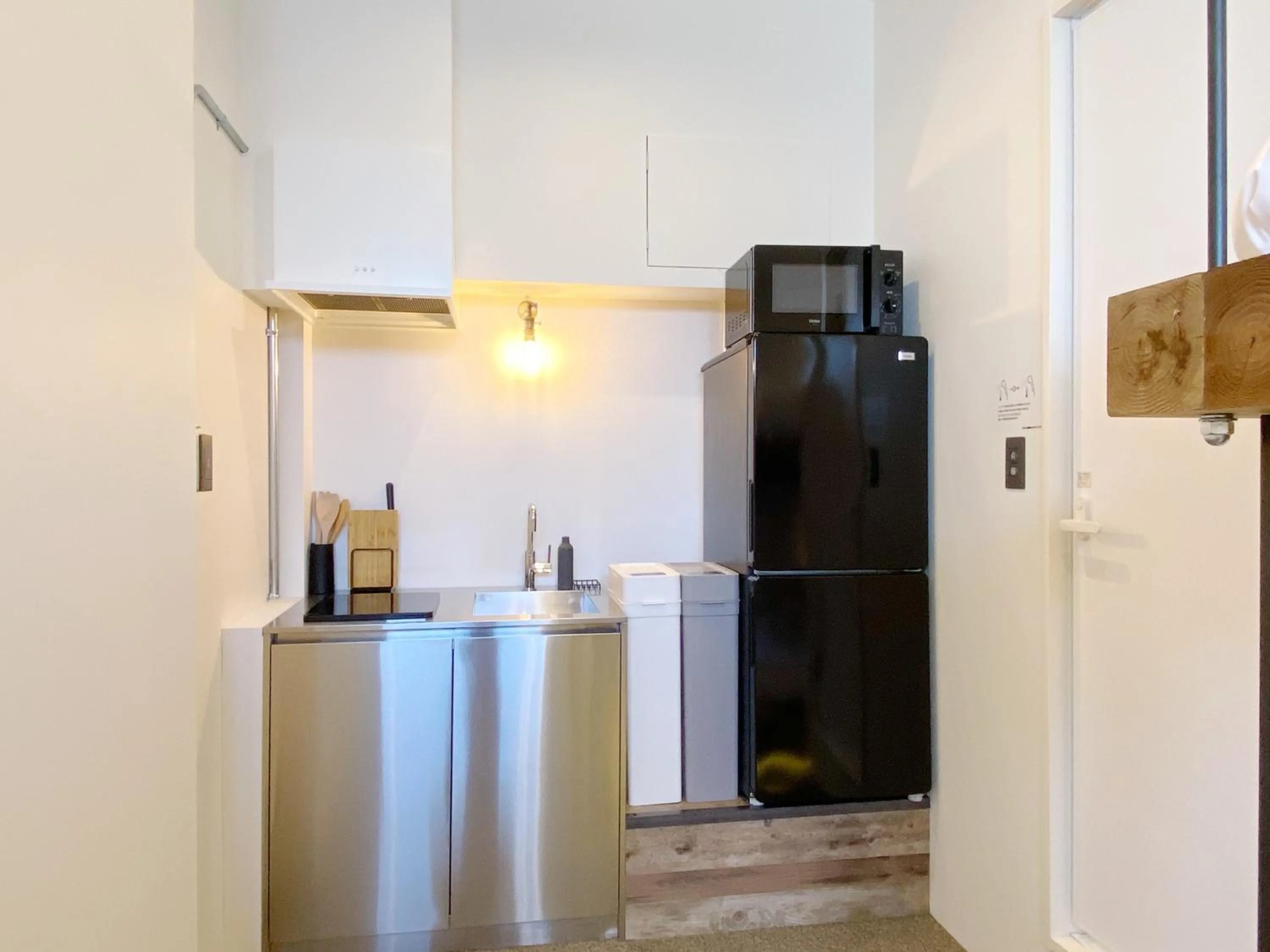 Kitchen or kitchenette in mizuka Imaizumi 1 - unmanned hotel -