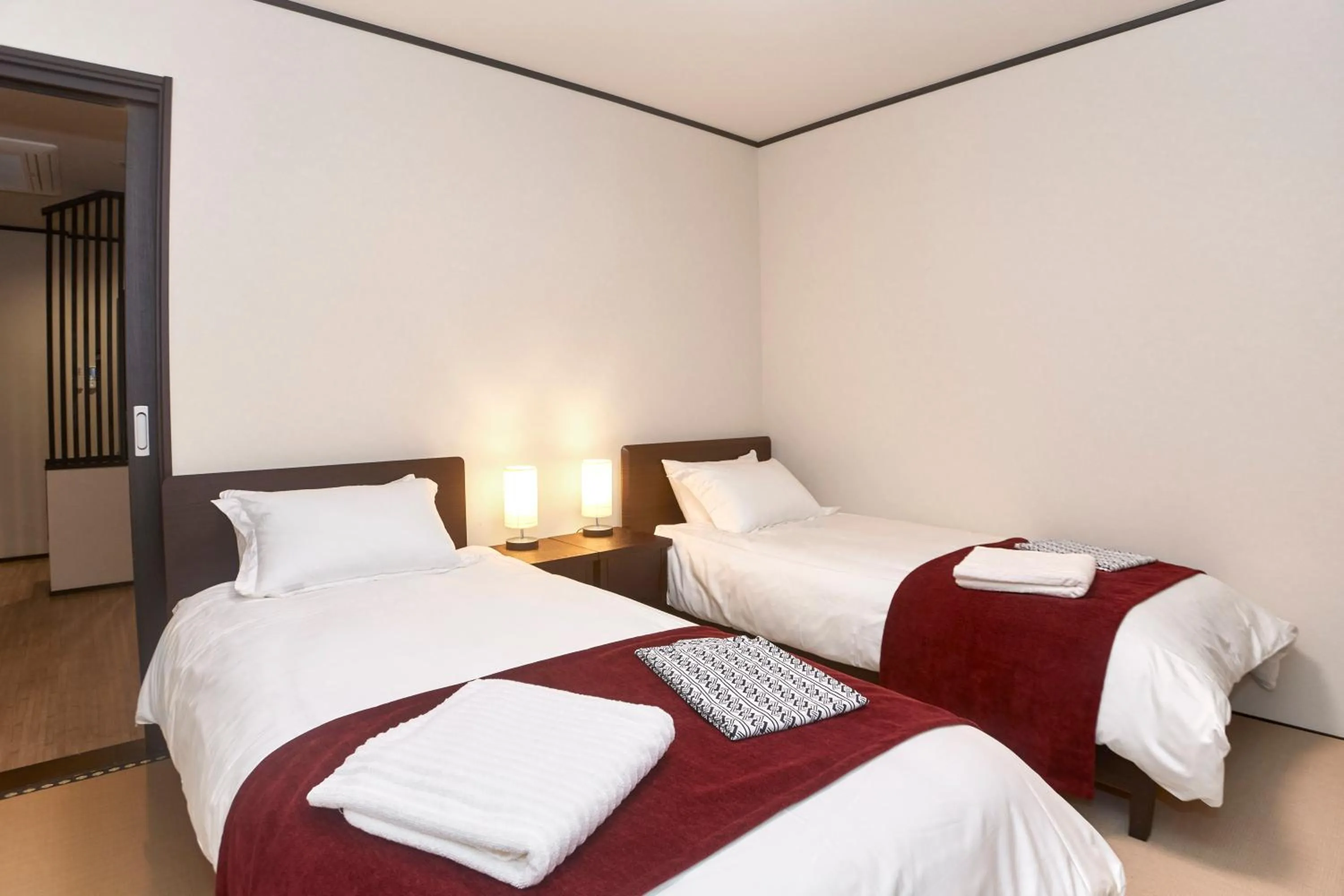 Bed in The Address Akakura