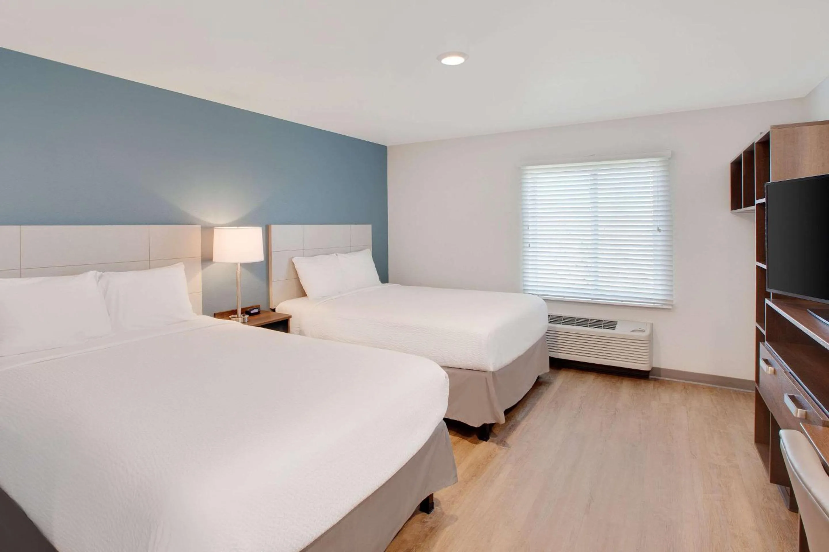 Photo of the whole room, Bed in WoodSpring Suites Nashville near Rivergate