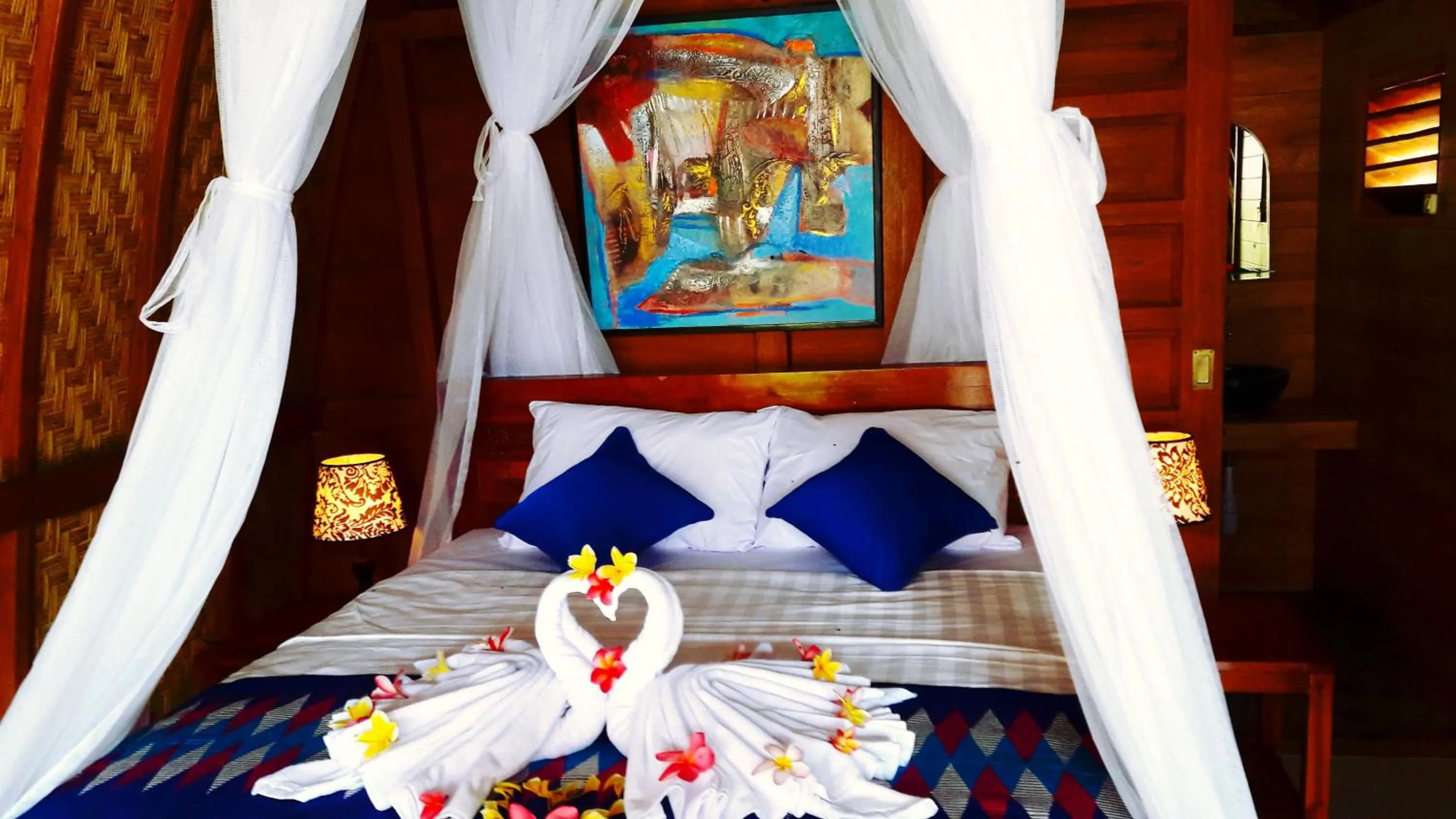 Bed in The Sandat Bungalow