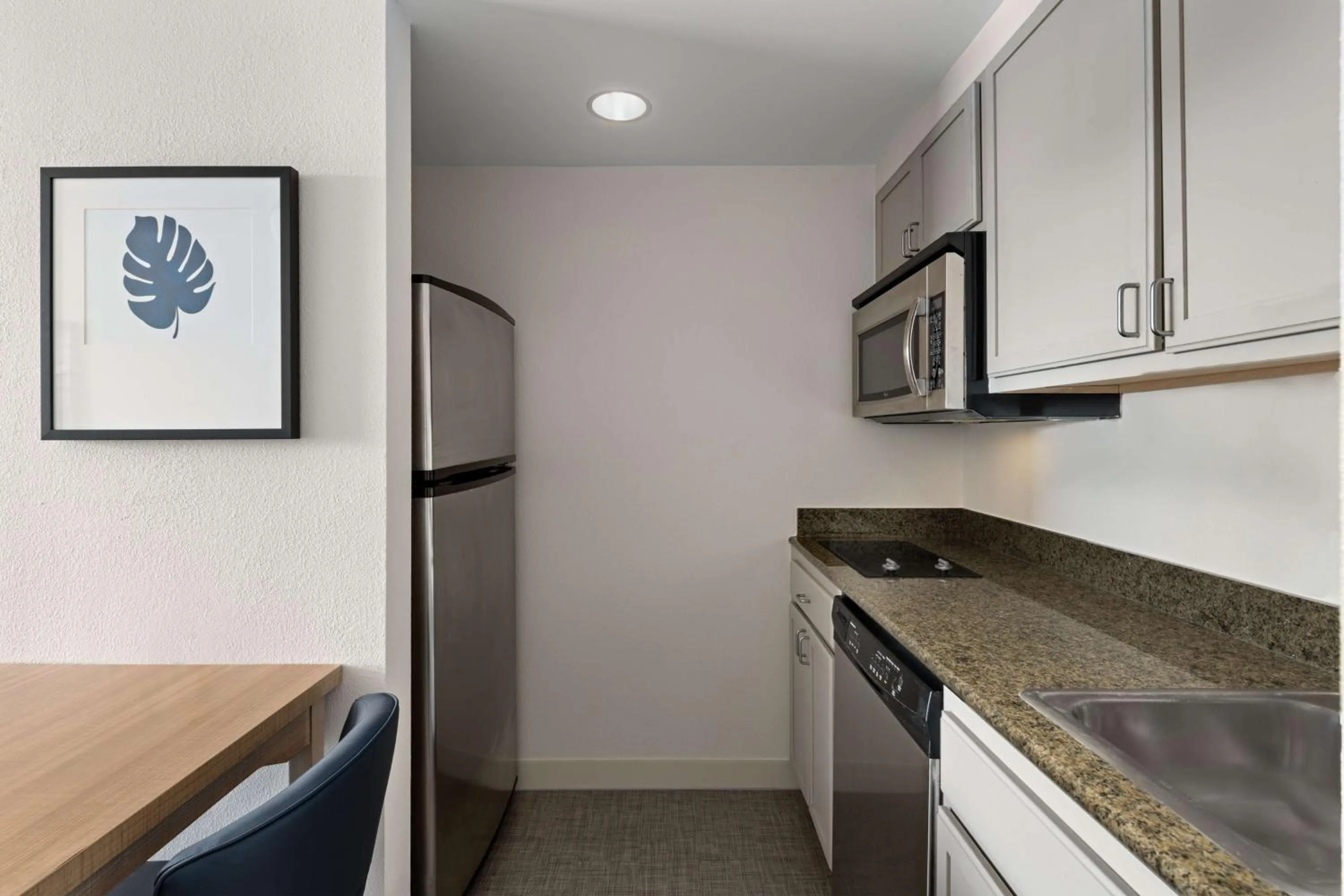 Kitchen or kitchenette in Homewood Suites by Hilton West Palm Beach