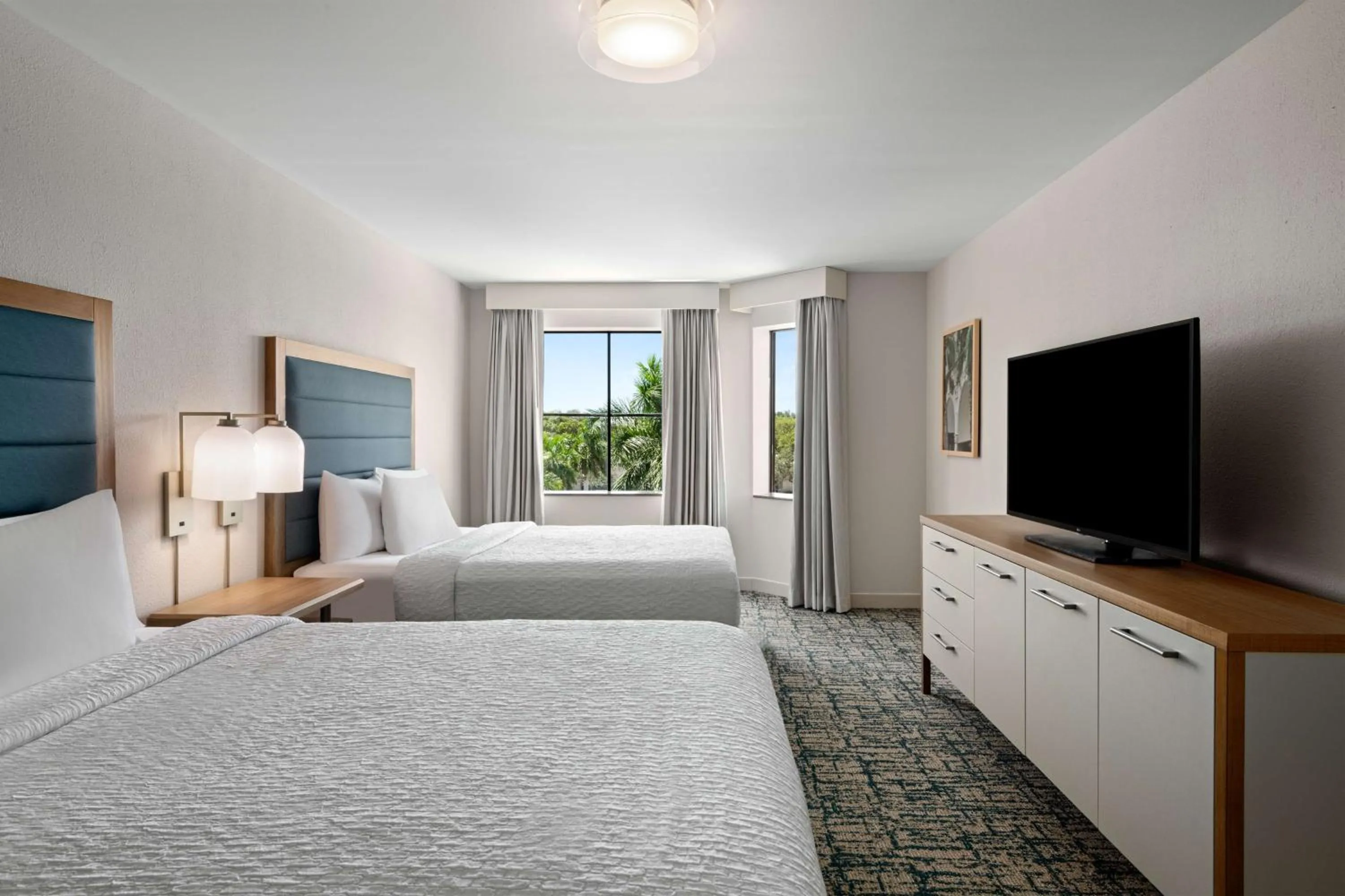 Bed in Homewood Suites by Hilton West Palm Beach