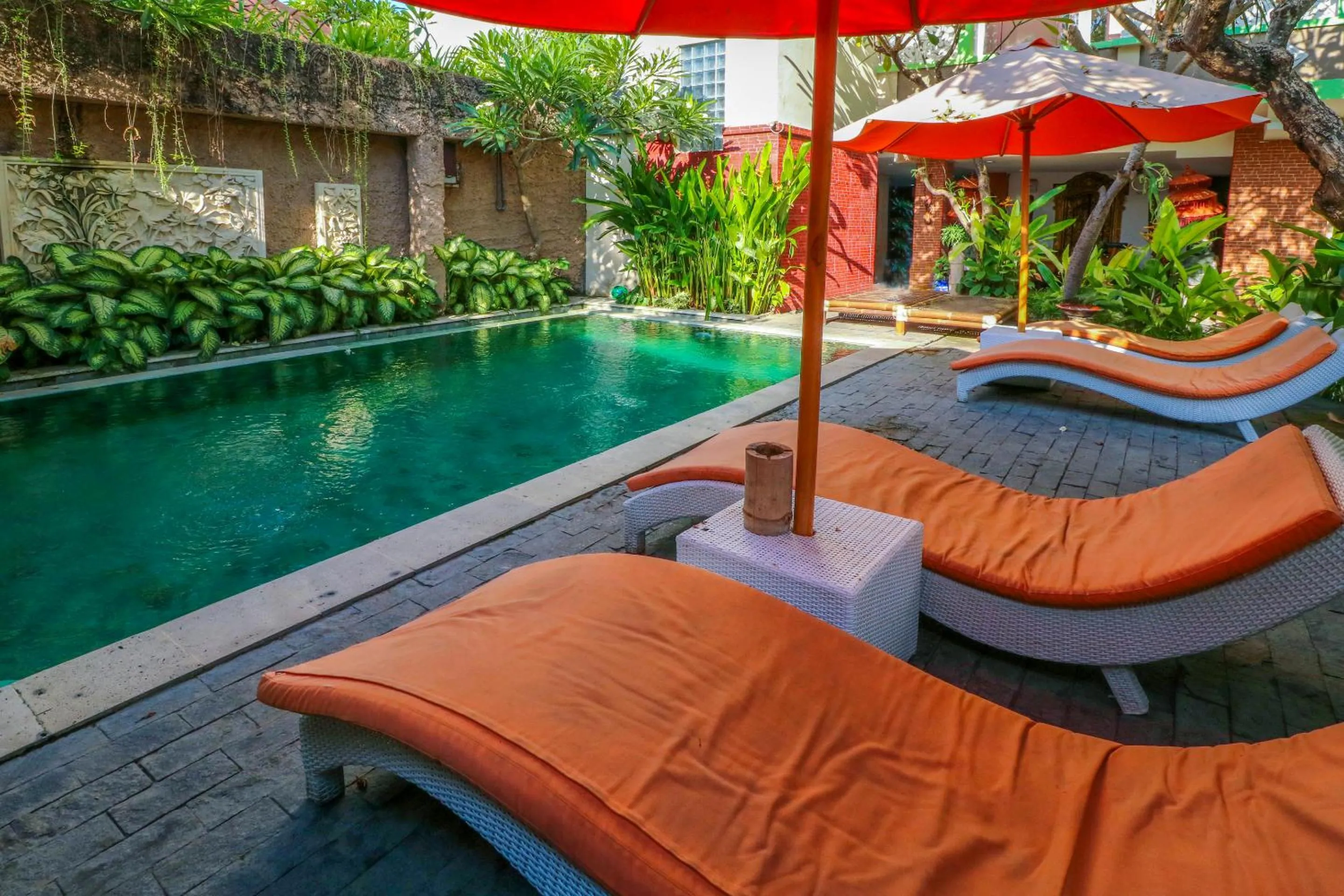 Swimming pool in Capital O 1666 Grand Pudjawan Hotel Near Kuta Beach