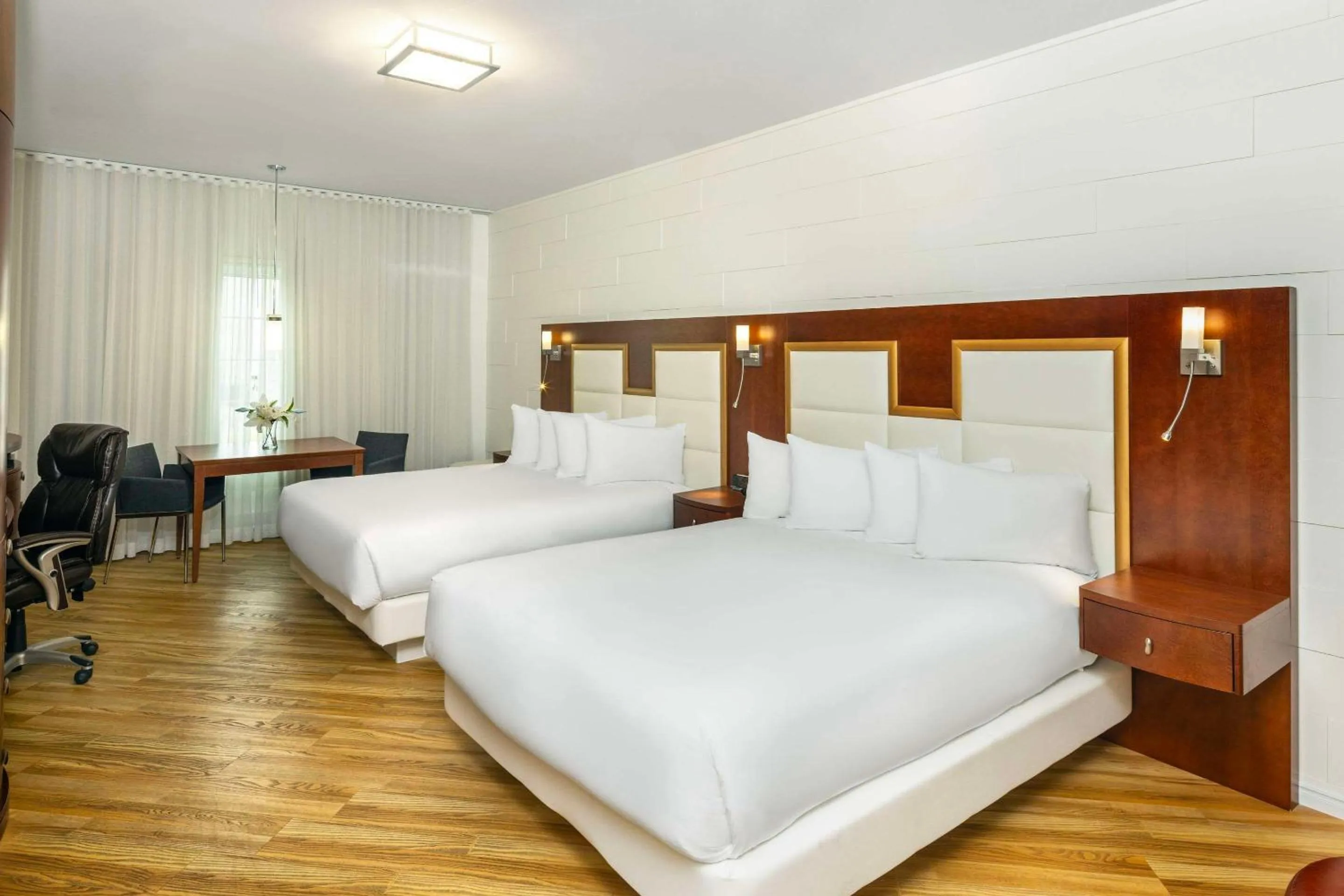 Bedroom, Bed in Les Suites de Laviolette, an Ascend Collection Hotel