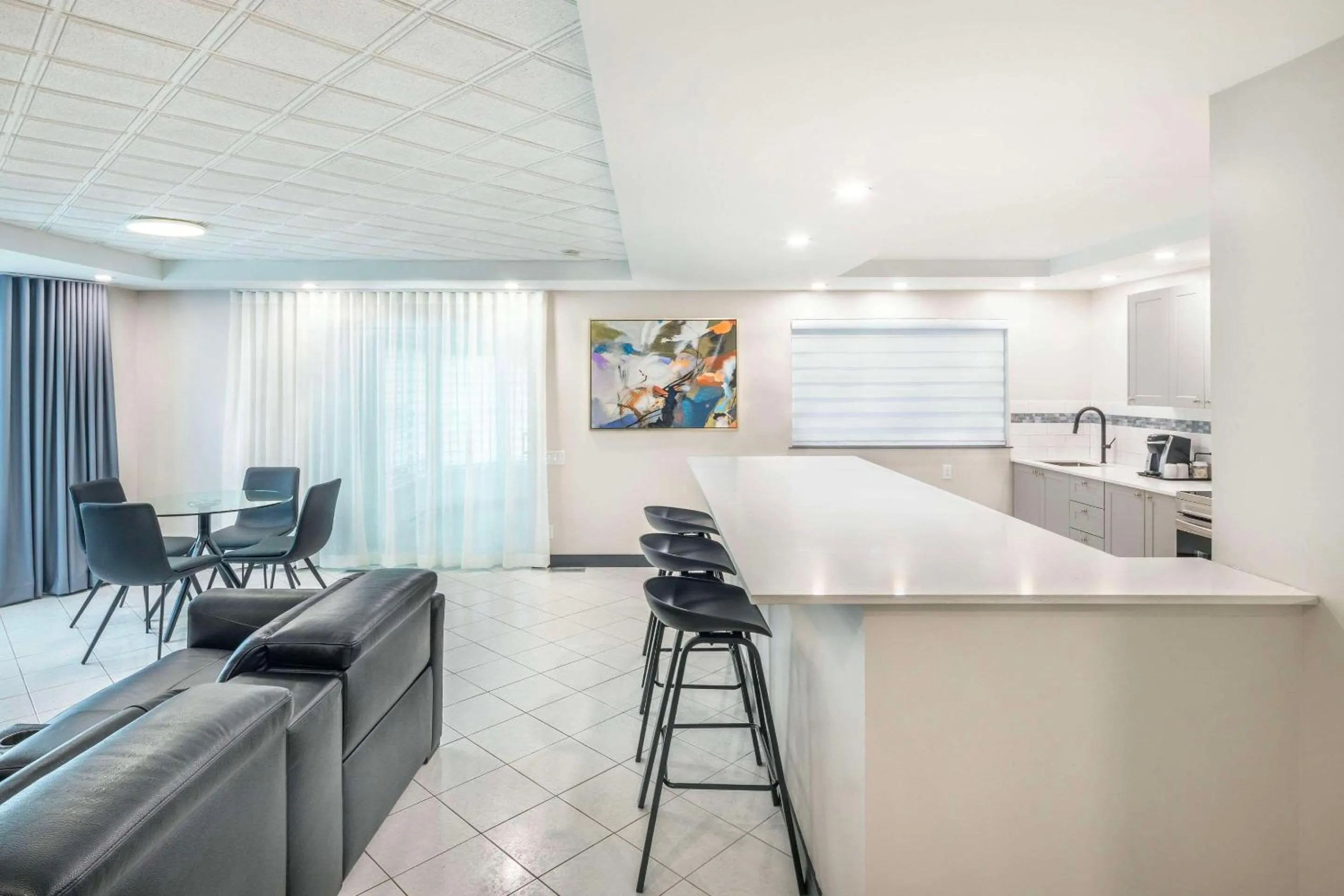 Bedroom in Les Suites de Laviolette, an Ascend Collection Hotel