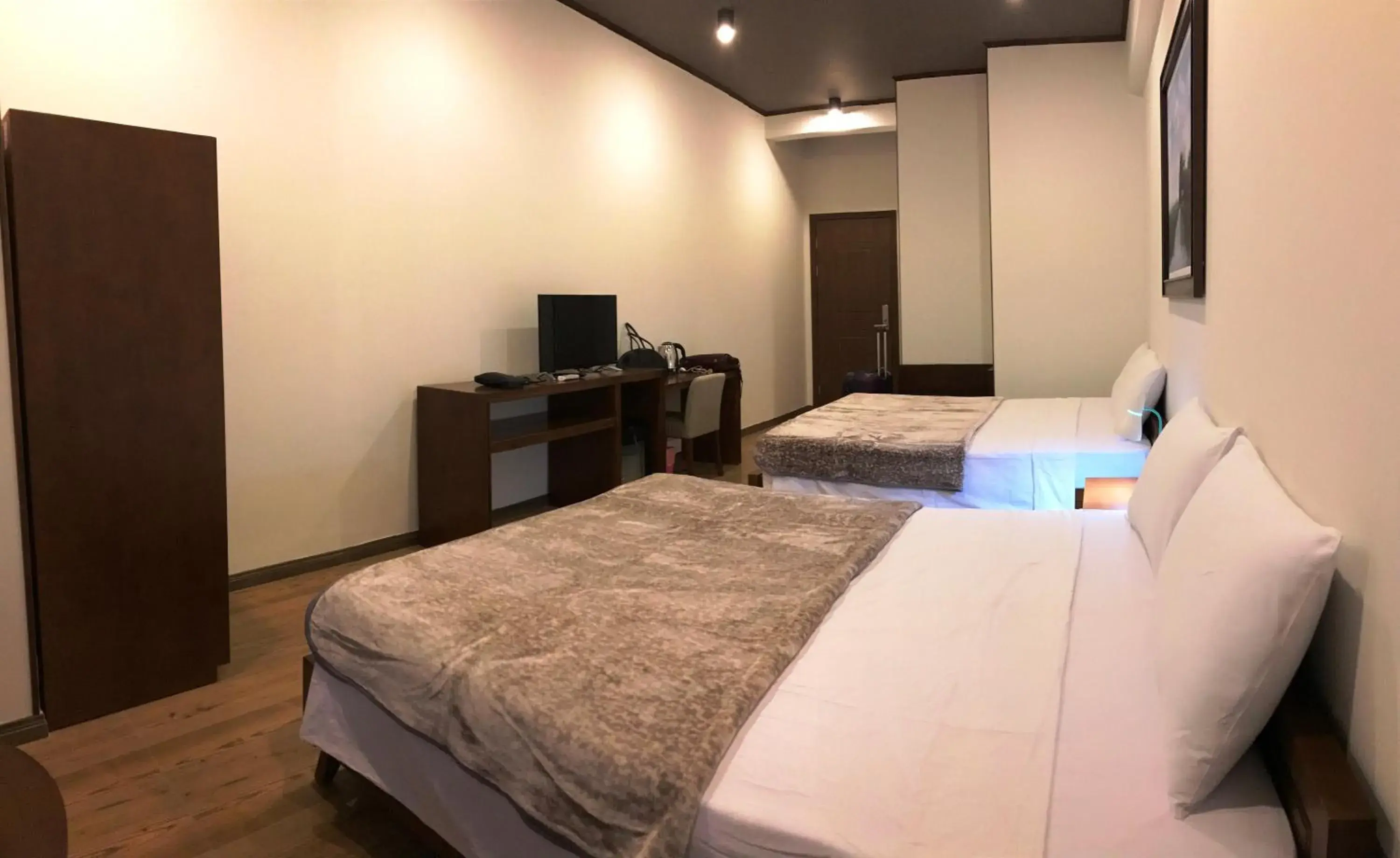 Bed in Oceanward Hotel & Resort Bed in Oceanward Hotel & Resort