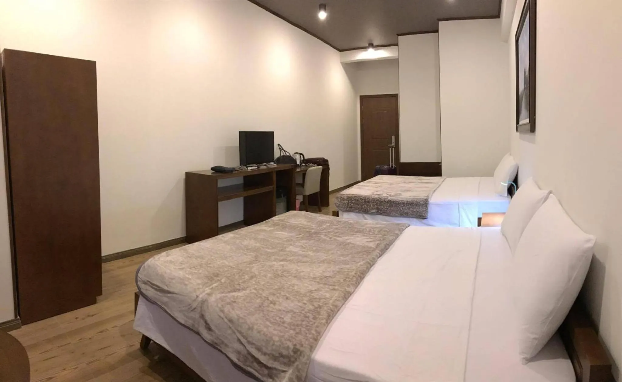 Bed in Oceanward Hotel & Resort