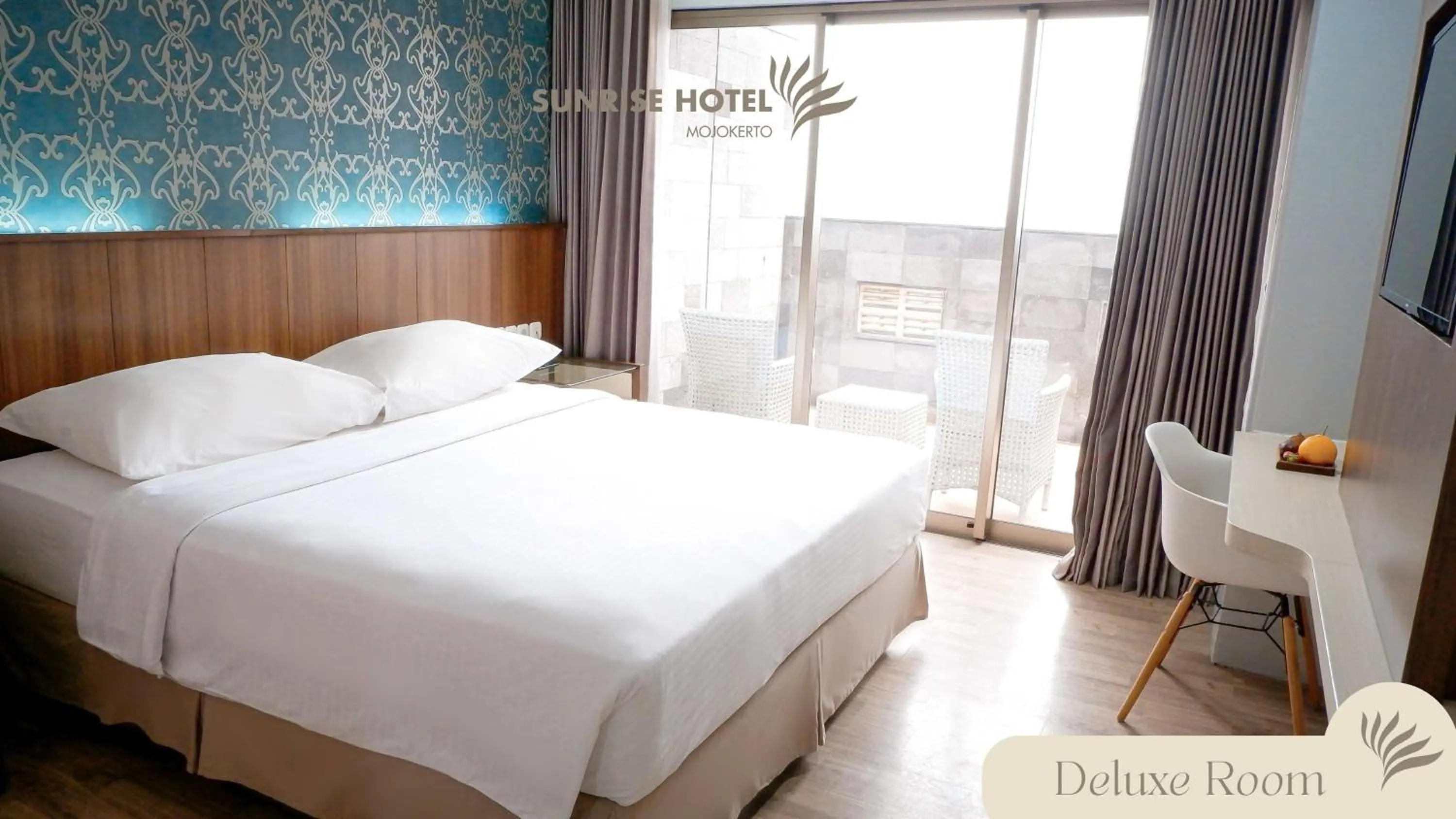 Bed in Sunrise Hotel Mojokerto