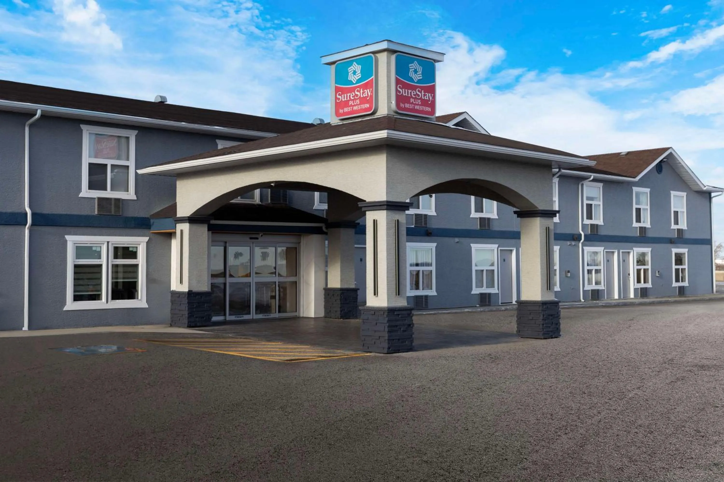 Property building in SureStay Plus by Best Western Brooks