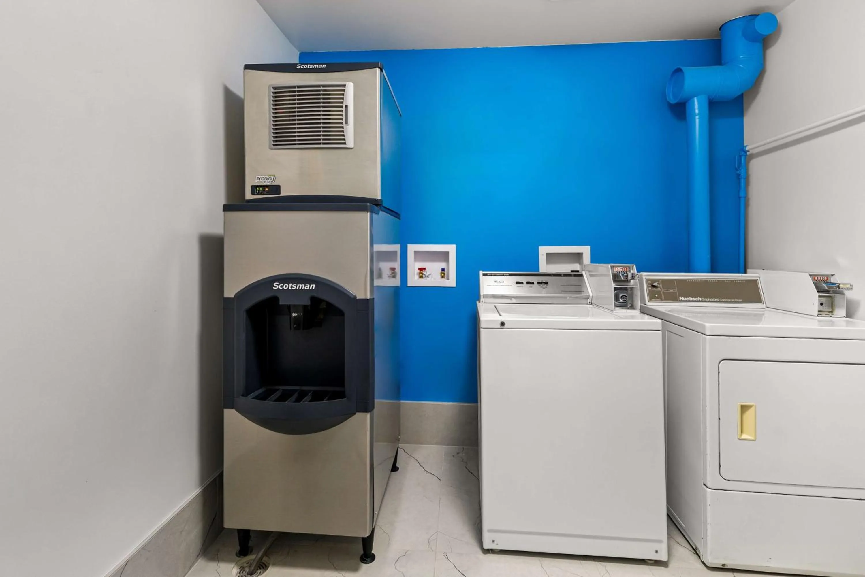 laundry in SureStay Plus by Best Western Brooks