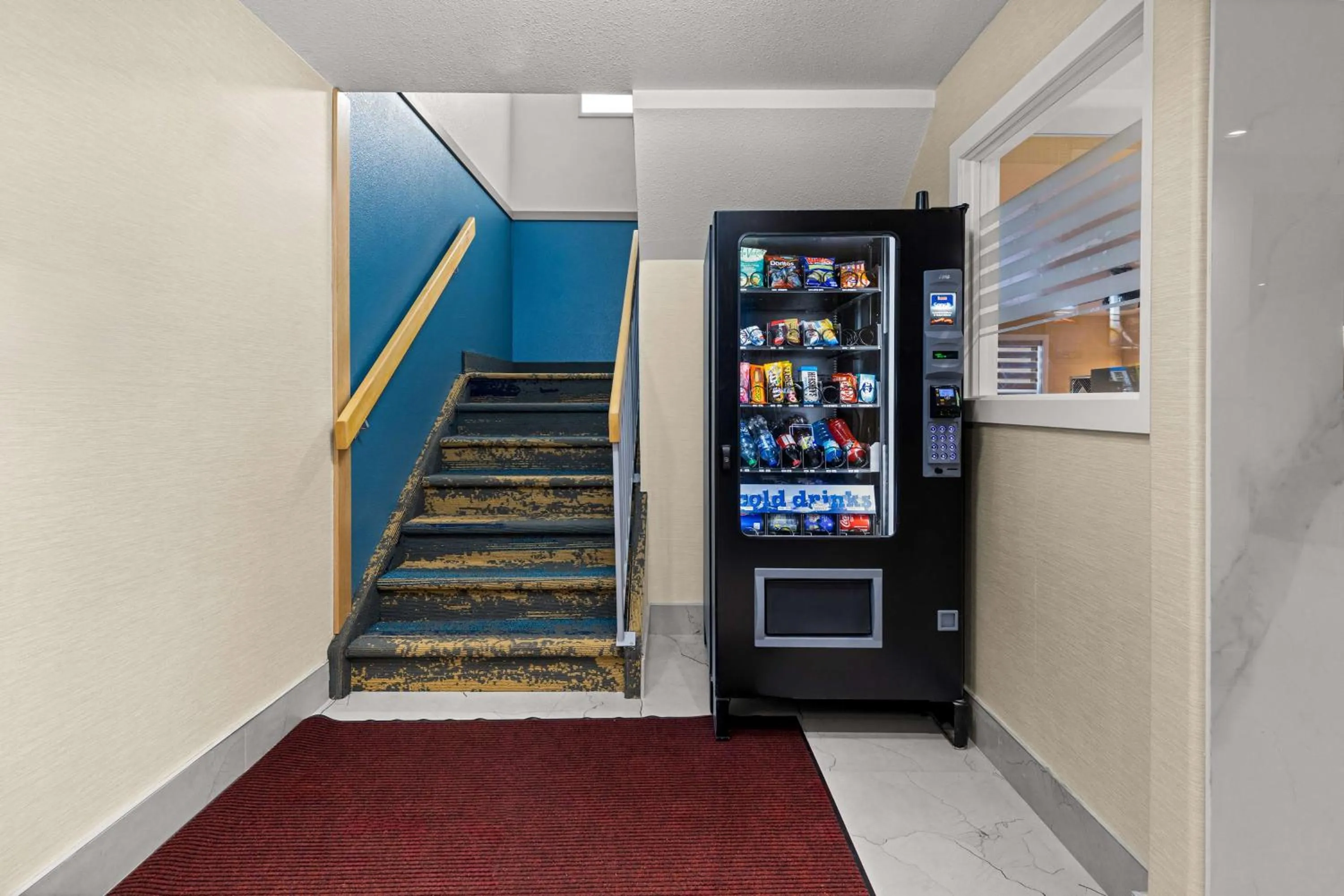 vending machine in SureStay Plus by Best Western Brooks