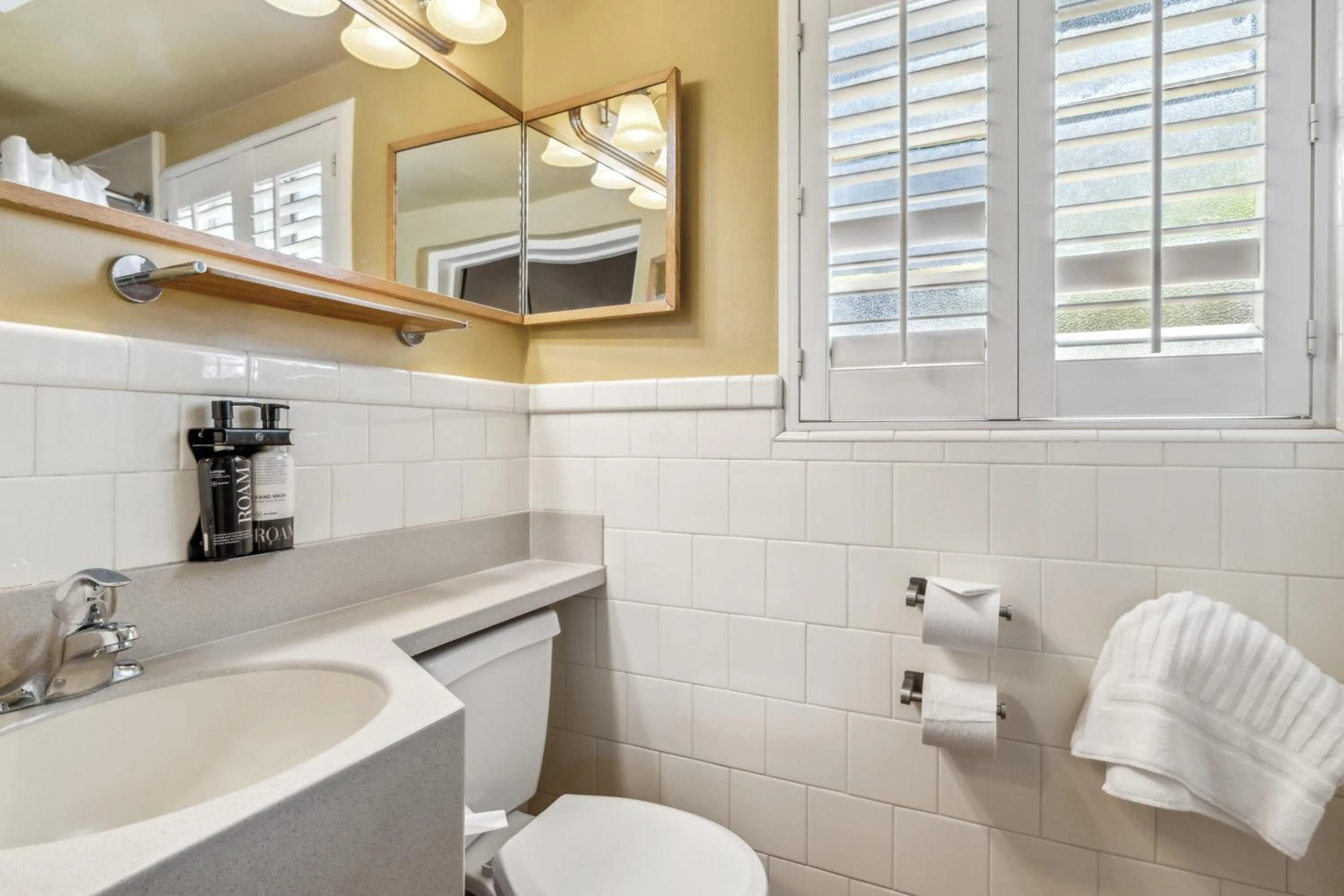 Toilet in Inn Marin and Suites, an Ascend Collection Hotel