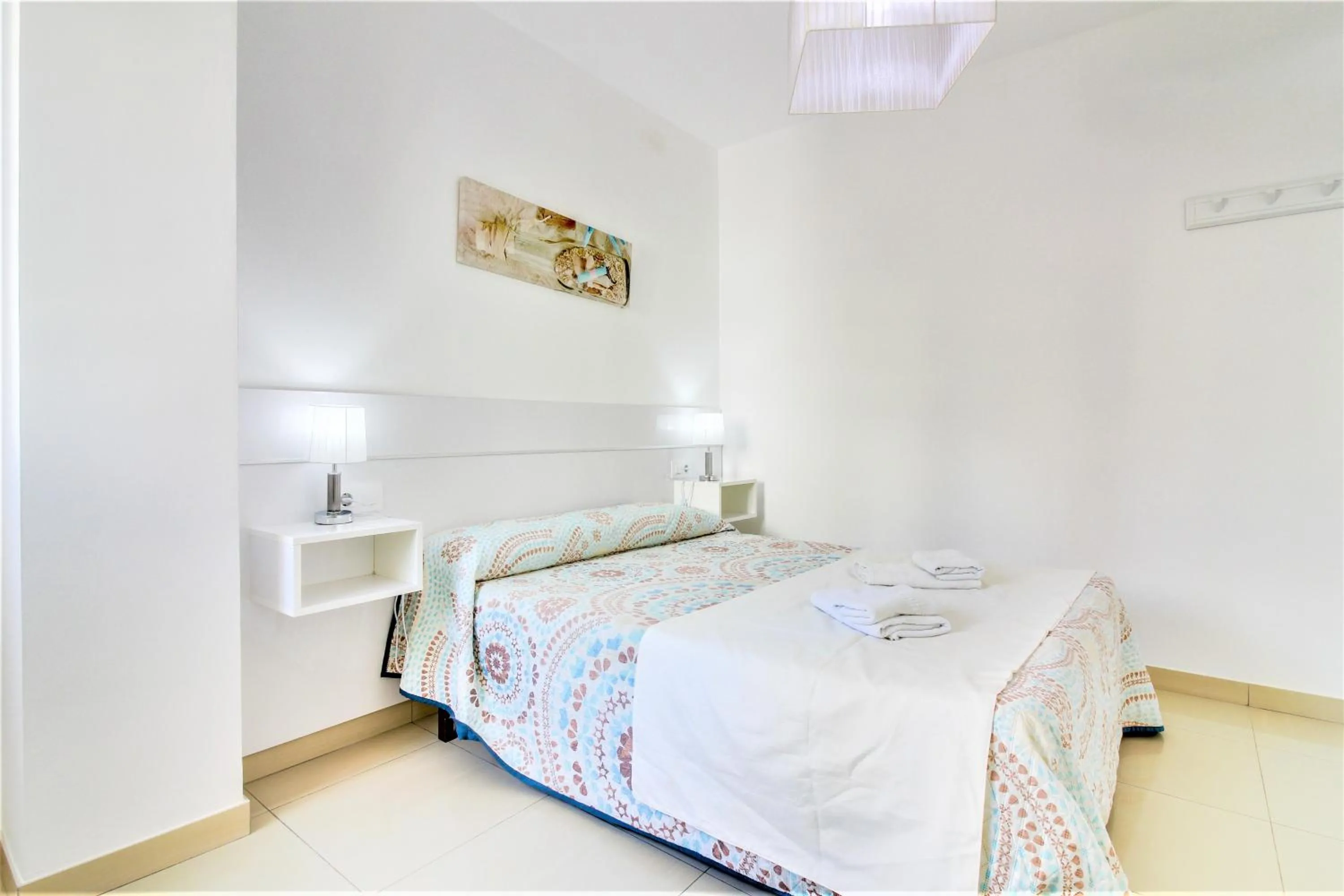Bed in Apartamento Las Palmeras