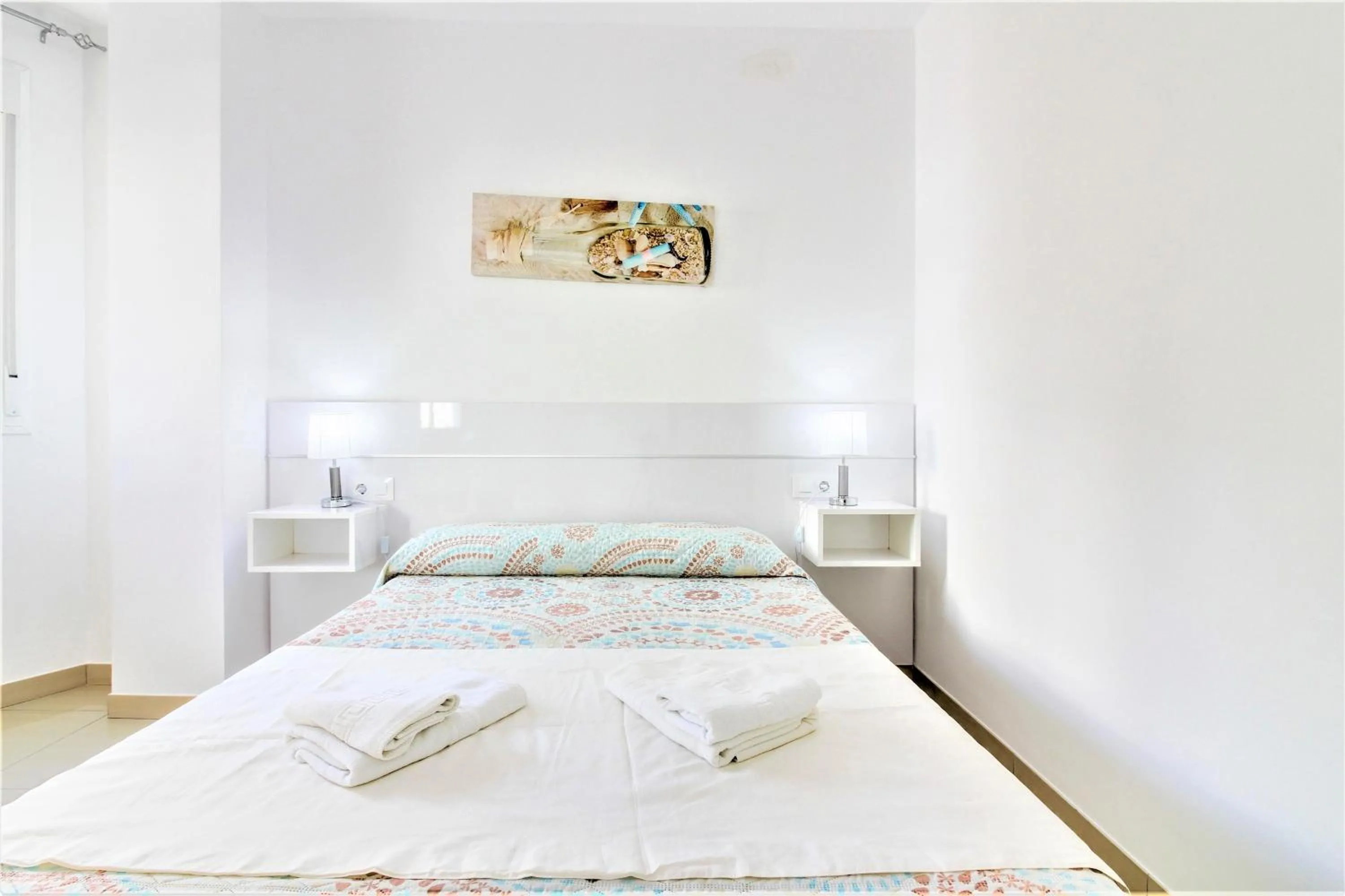 Bed in Apartamento Las Palmeras