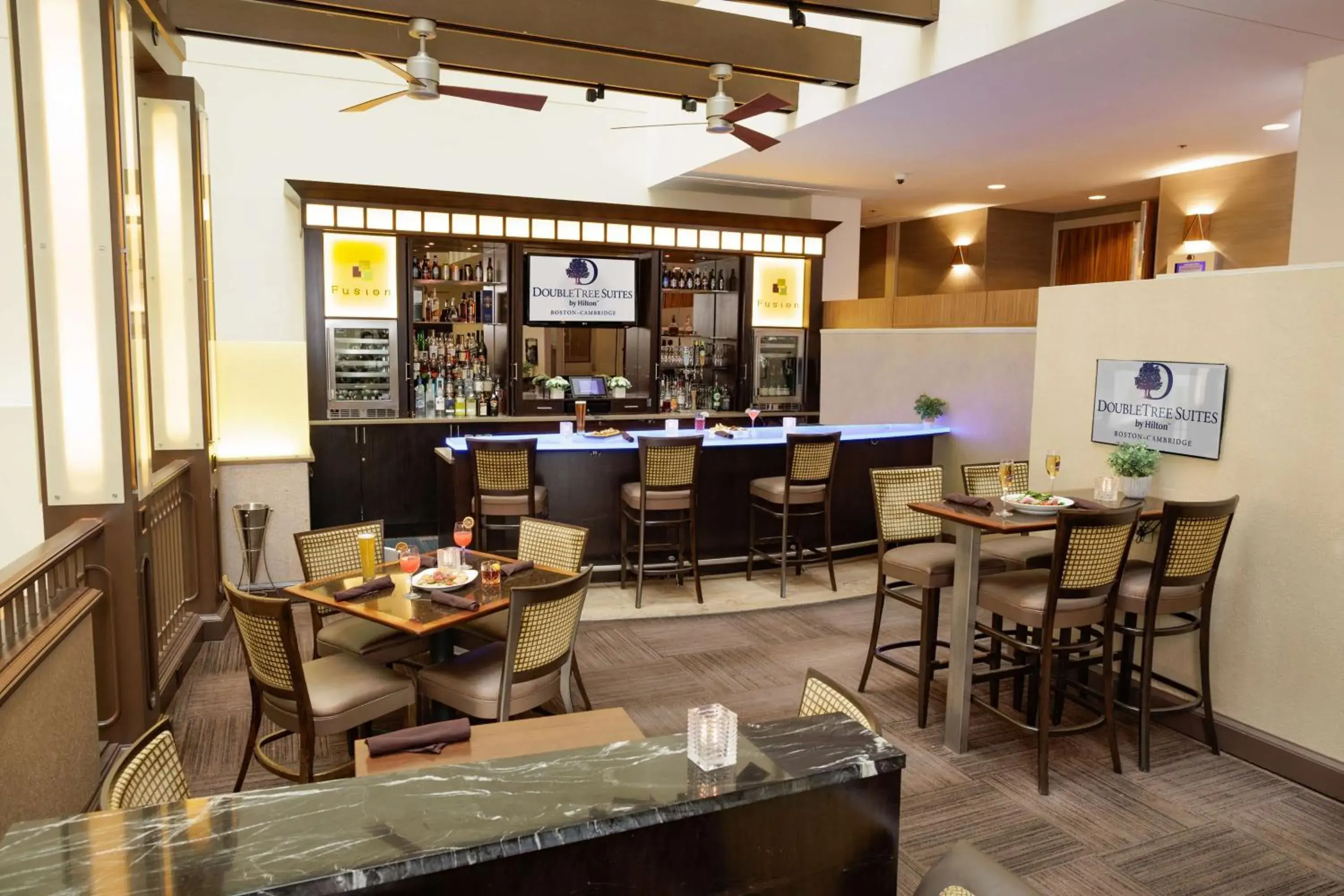 Lounge or bar in DoubleTree Suites by Hilton Hotel Boston - Cambridge Lounge or bar in DoubleTree Suites by Hilton Hotel Boston - Cambridge