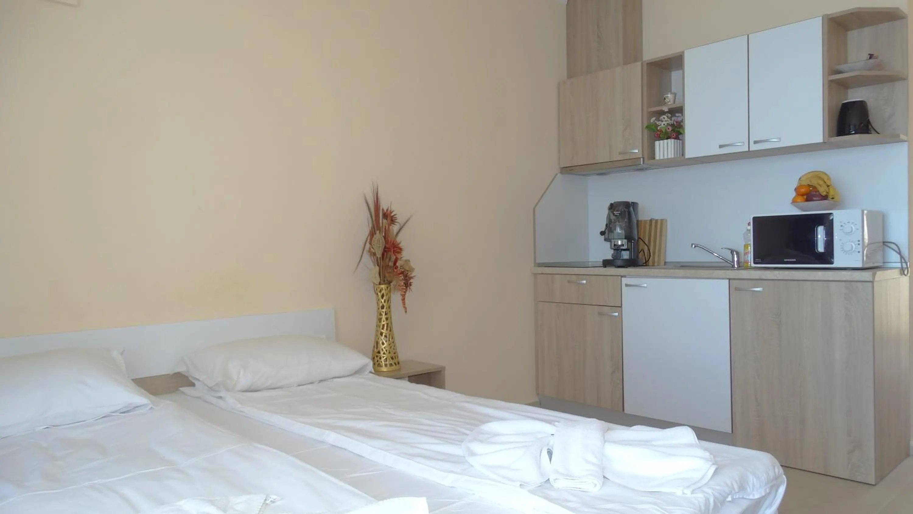 Bed in Akrotiria Beach Apart Complex
