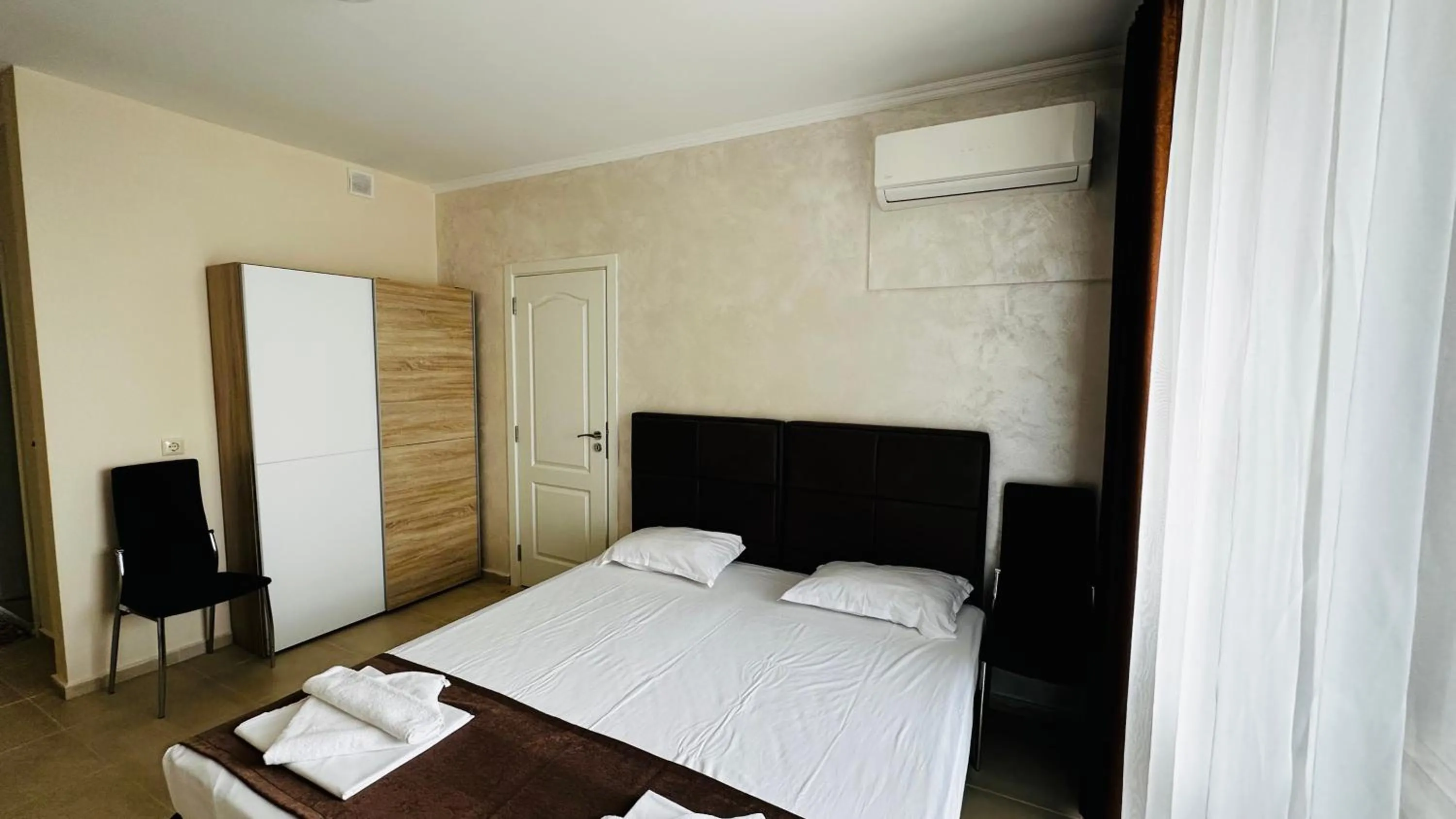 Bed in Akrotiria Beach Apart Complex
