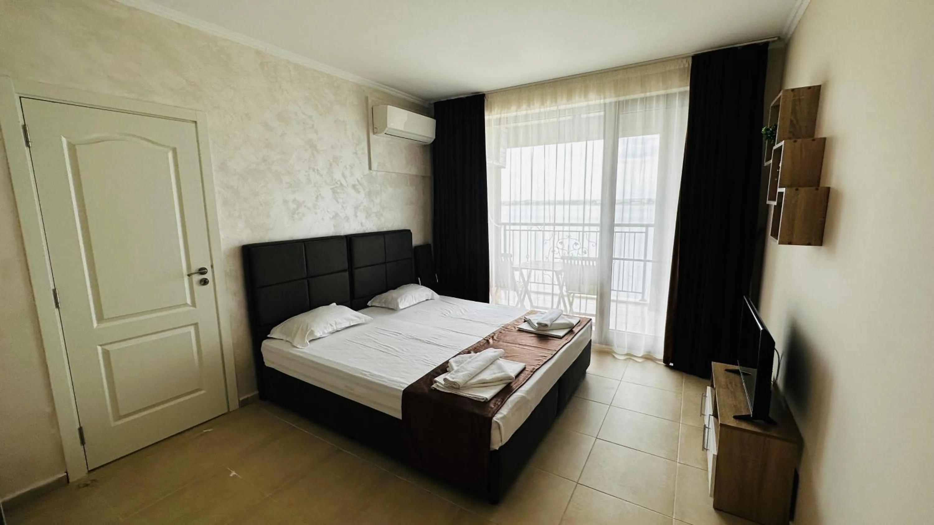 Bed in Akrotiria Beach Apart Complex