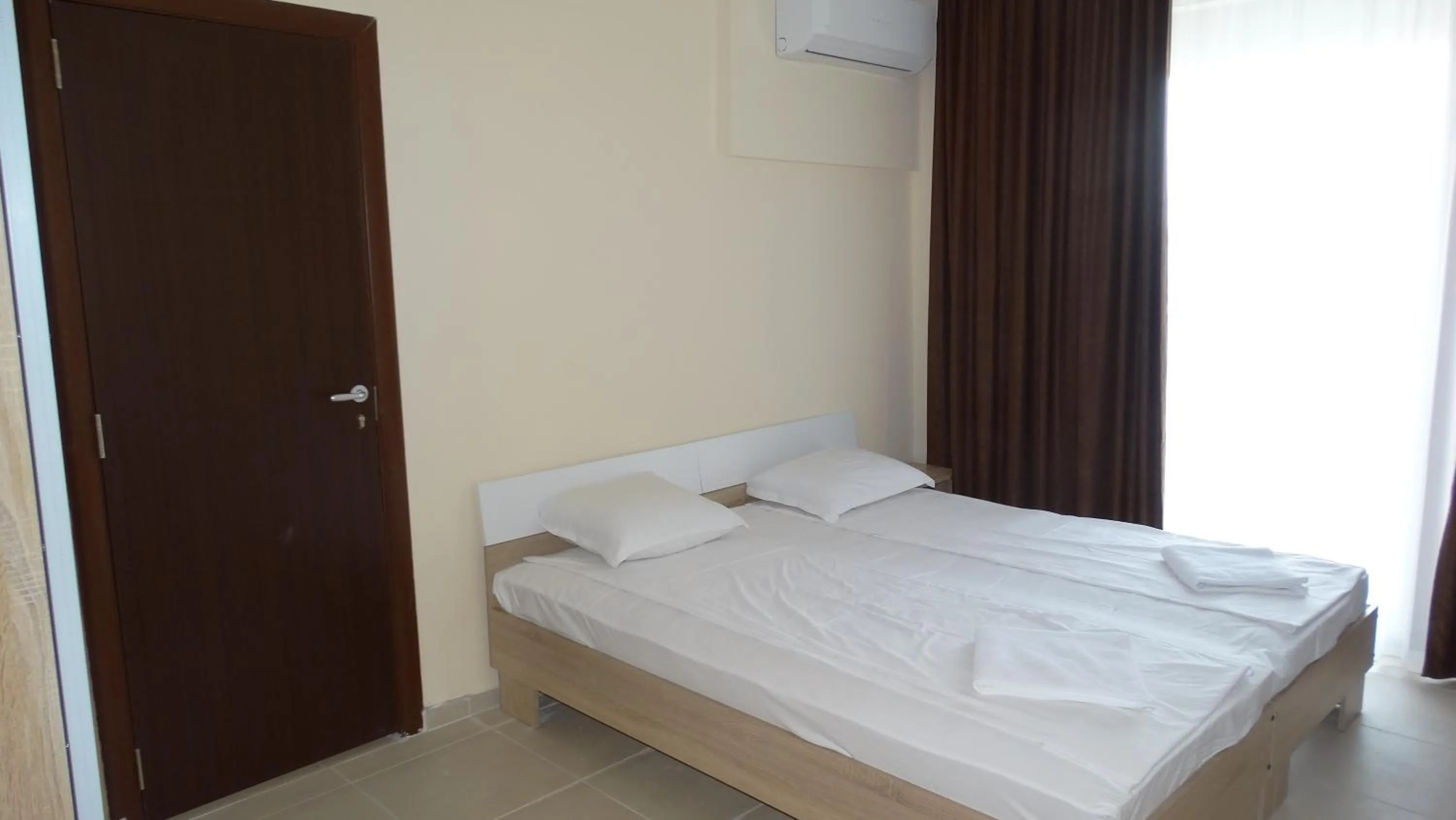 Bed in Akrotiria Beach Apart Complex