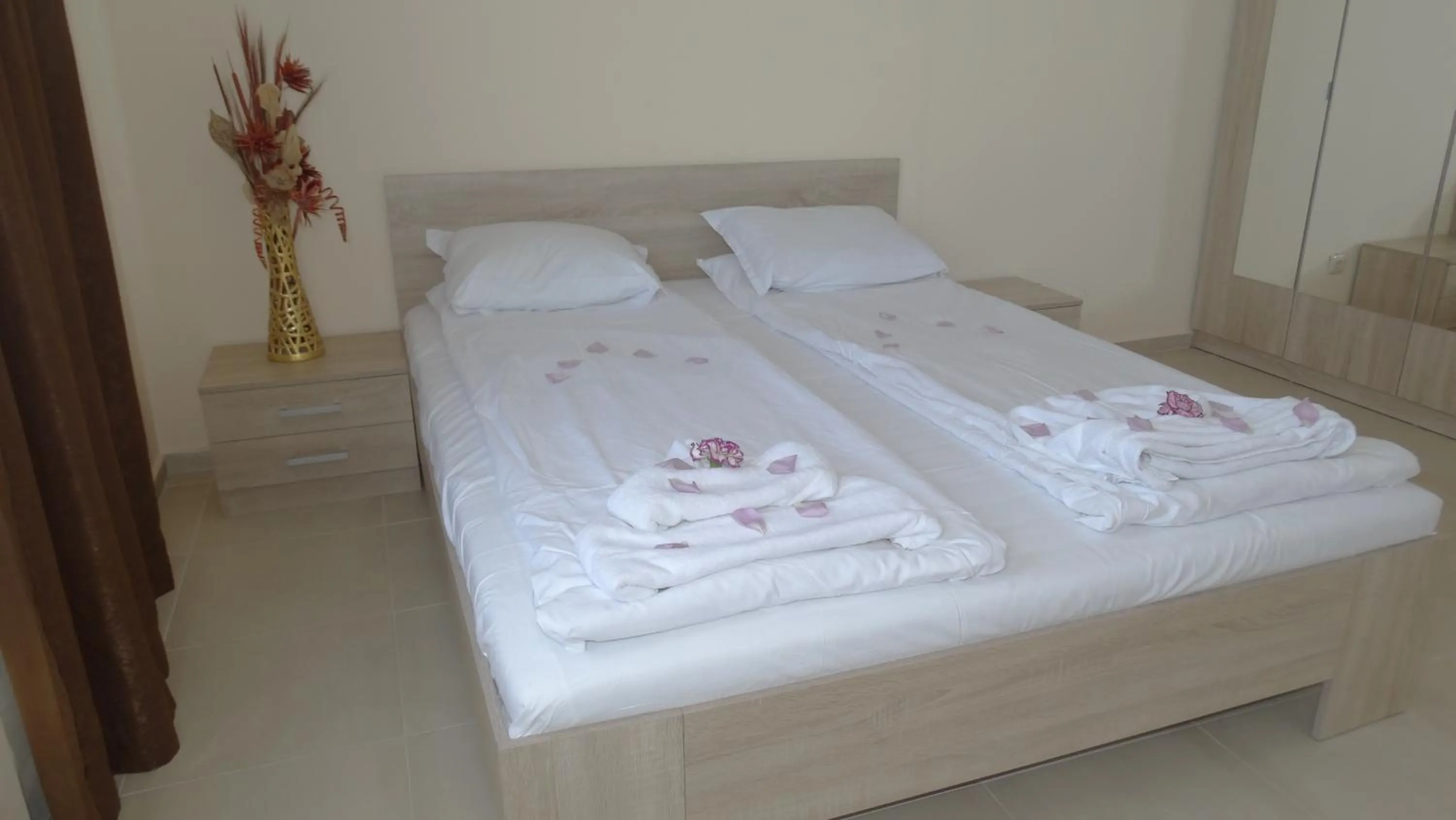 Bed in Akrotiria Beach Apart Complex