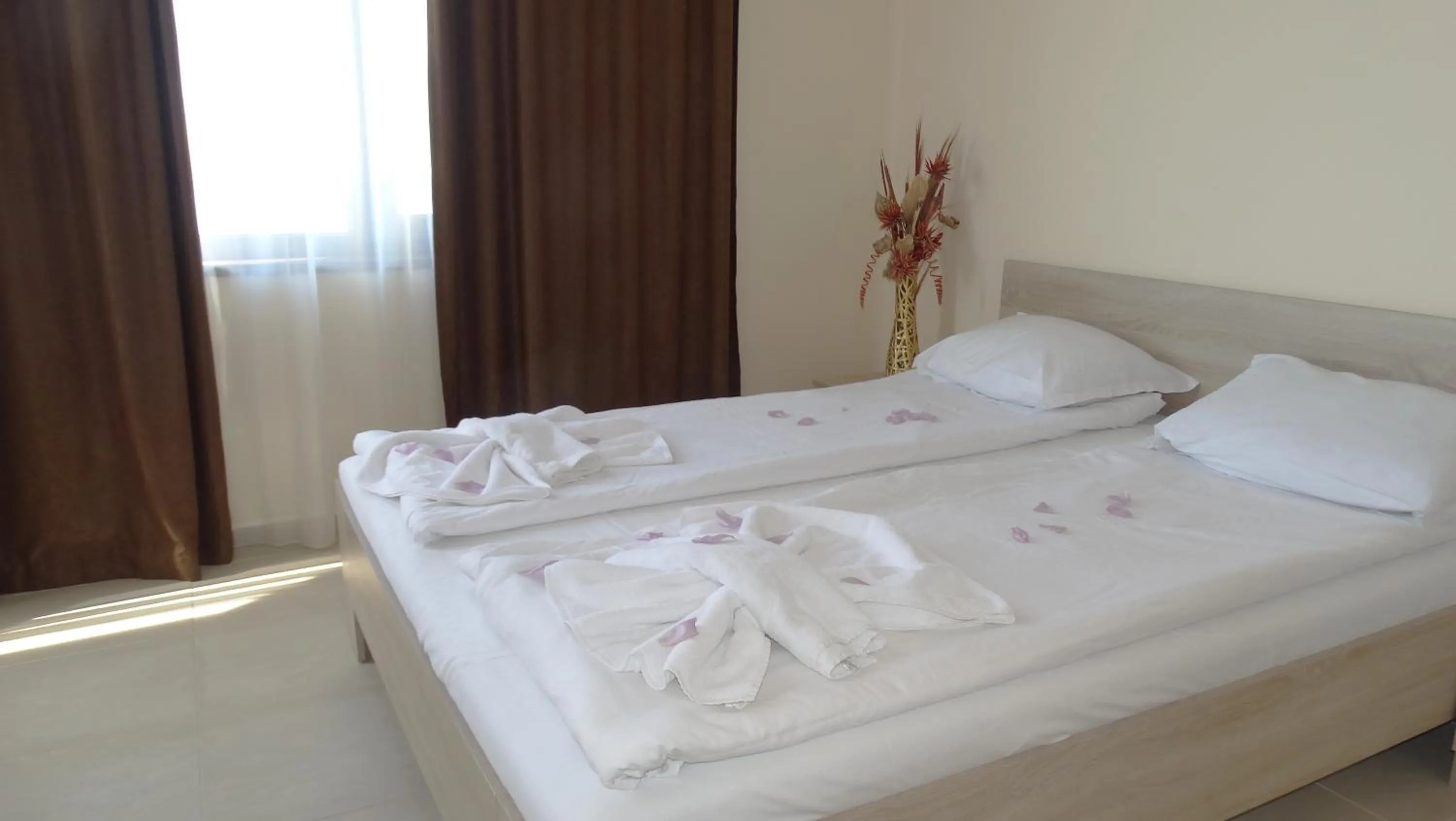Bed in Akrotiria Beach Apart Complex