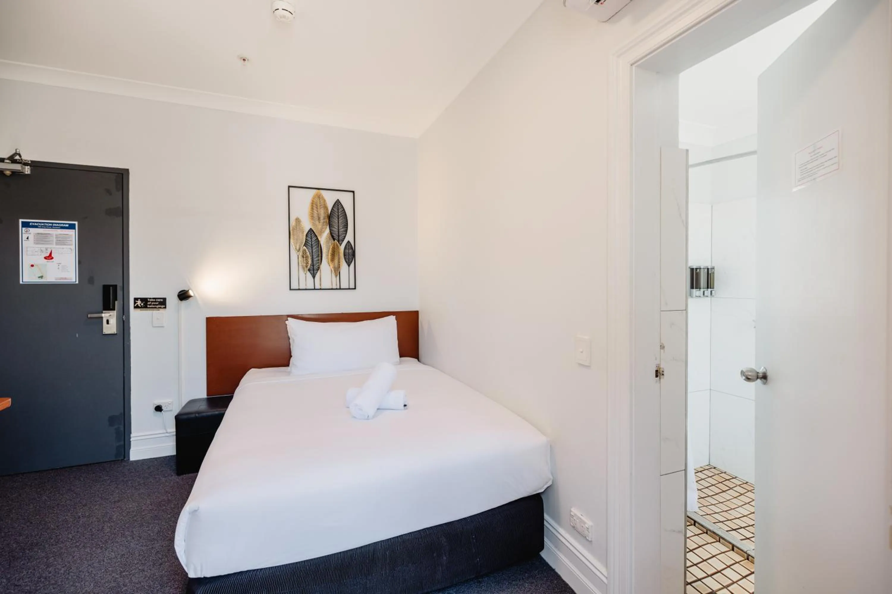 Bed in Newtown Cozy Stays