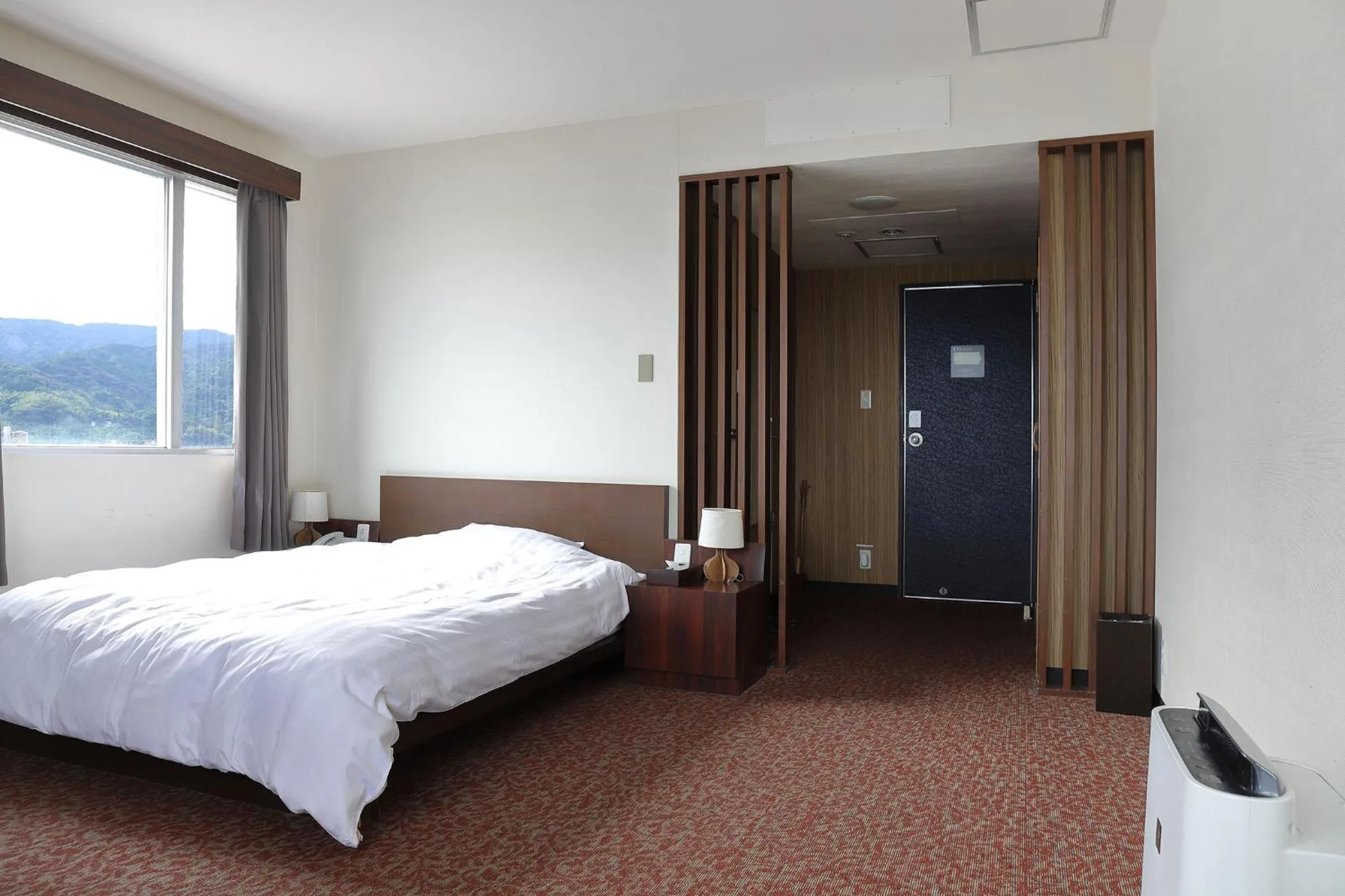 Bed in Ooedo Onsen Monogatari Beppu Seifu