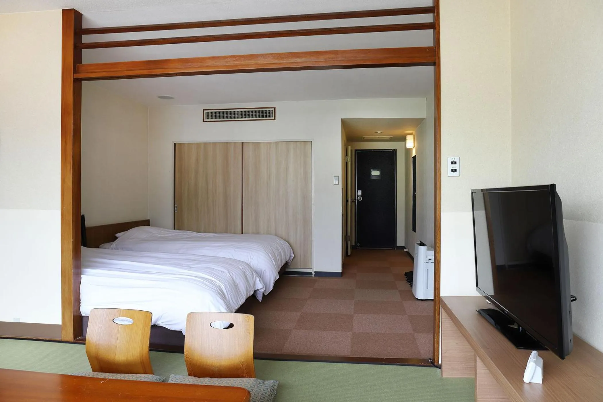 Bed in Ooedo Onsen Monogatari Beppu Seifu