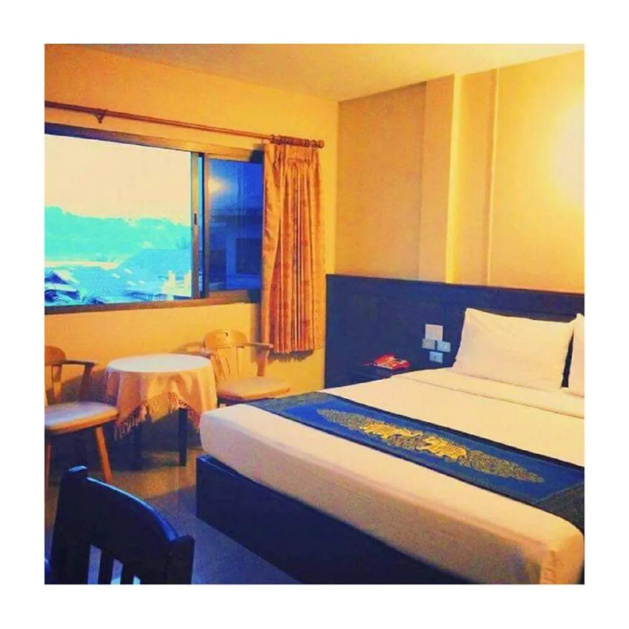 Bedroom in Chiangkhong Green Inn Resident