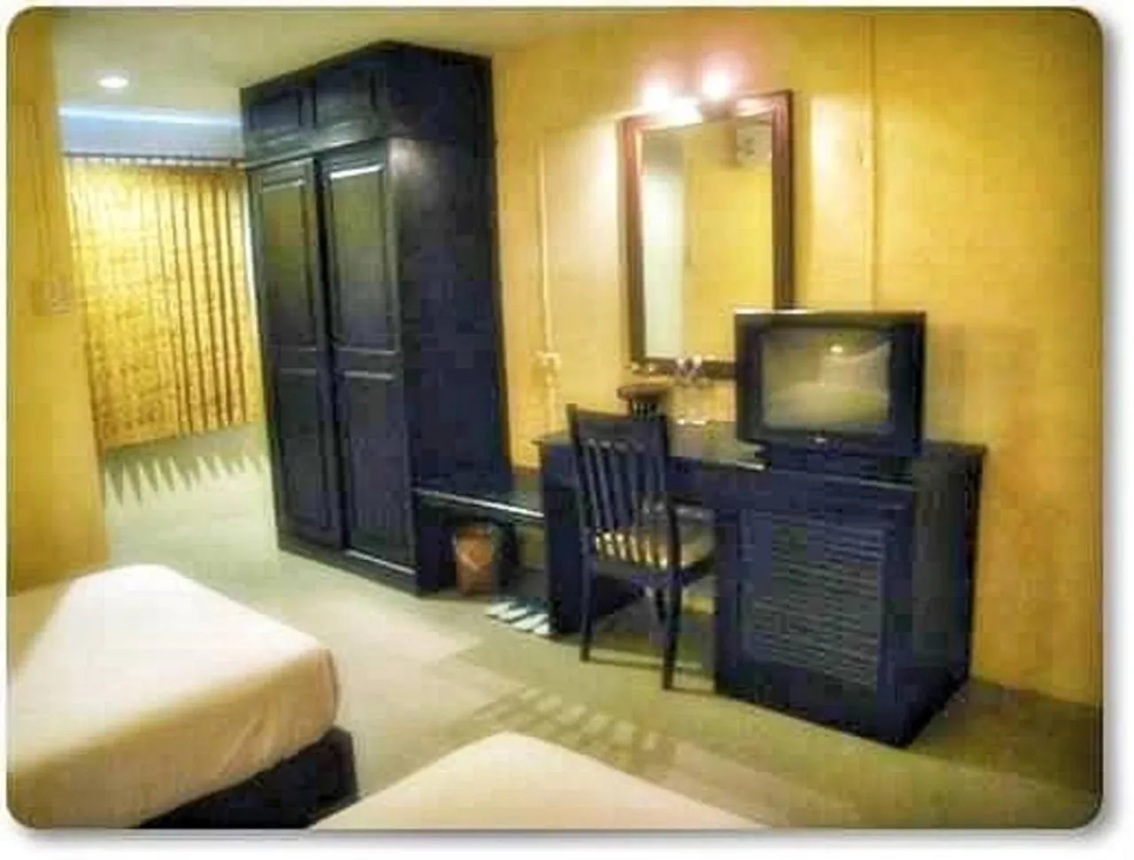 Bedroom in Chiangkhong Green Inn Resident