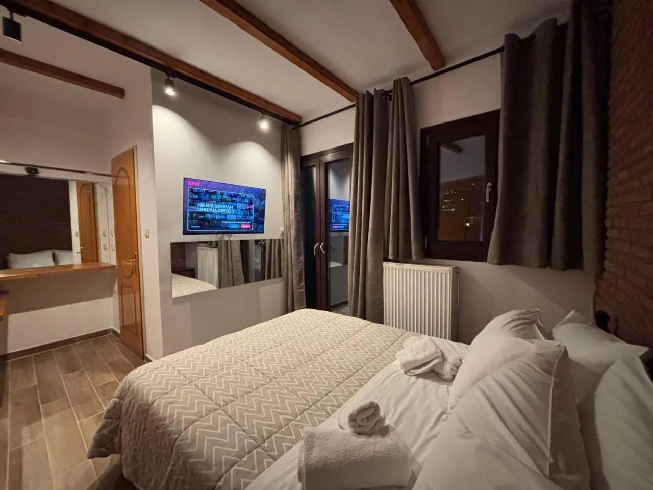 Bed in Tzovolos Apartments