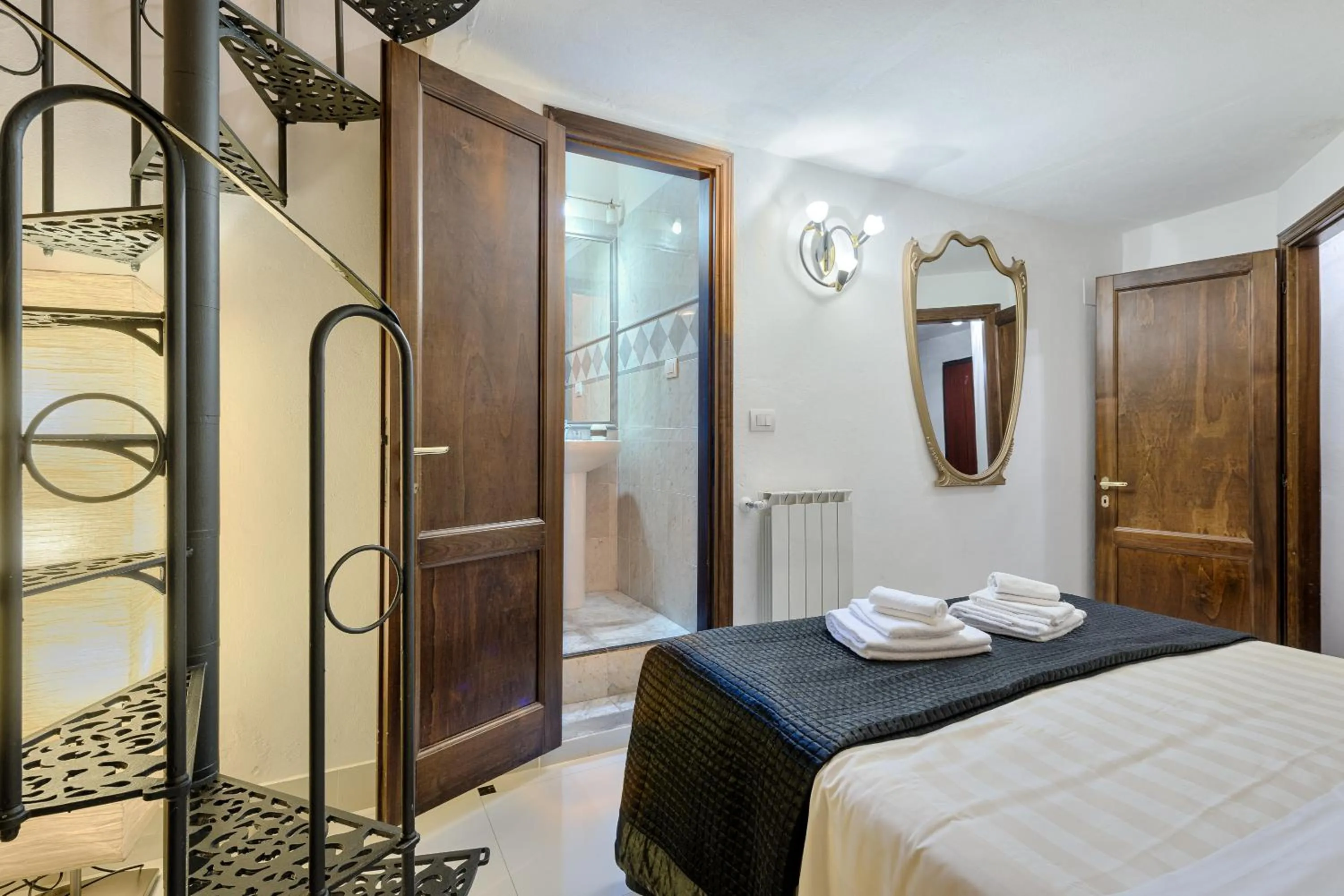 Photo of the whole room, Bed in Santo Spirito Frescos by Mmega