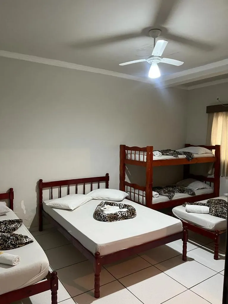 Bed in Hotel Romaria Aparecida