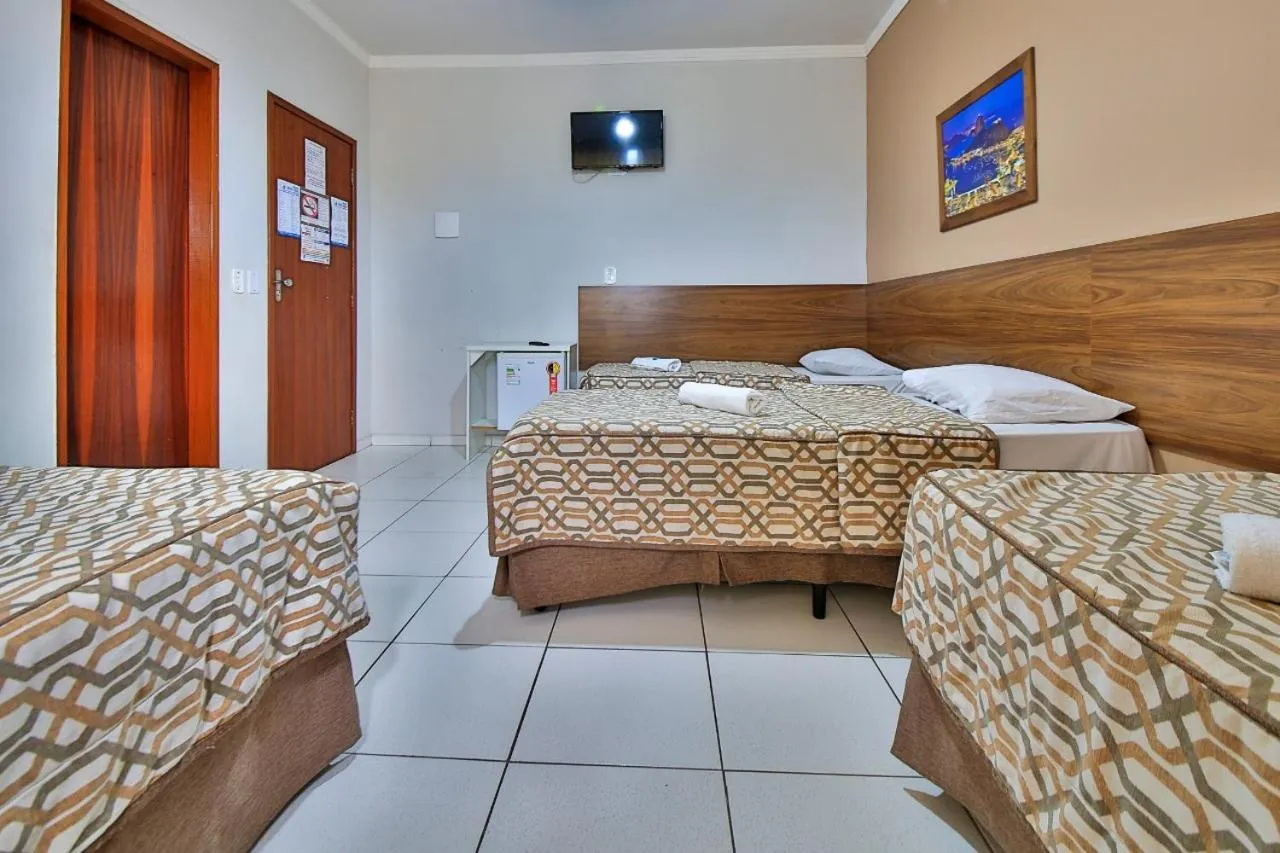 Bed in Hotel Romaria Aparecida