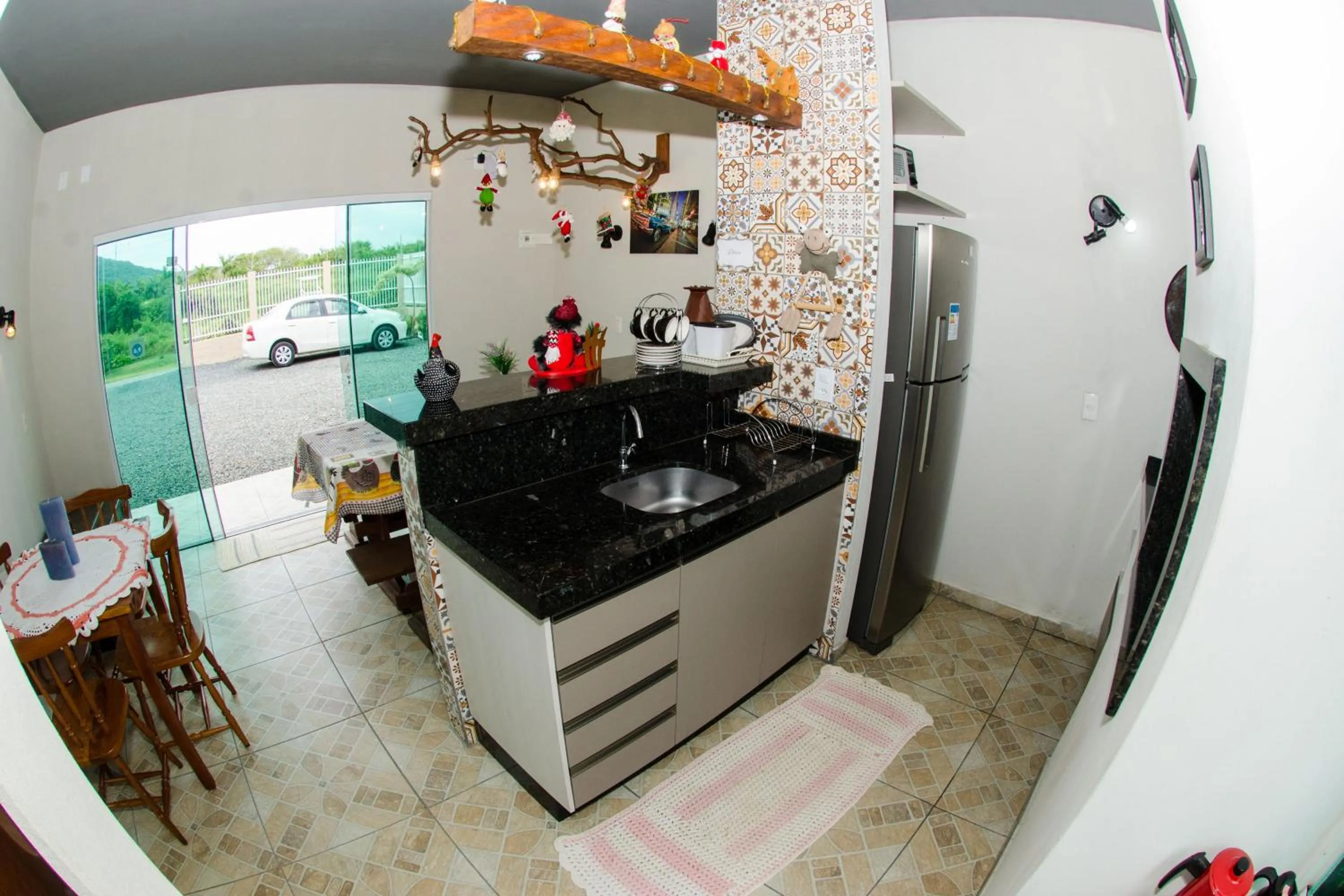 Kitchen or kitchenette in Marlindo Hospedagem