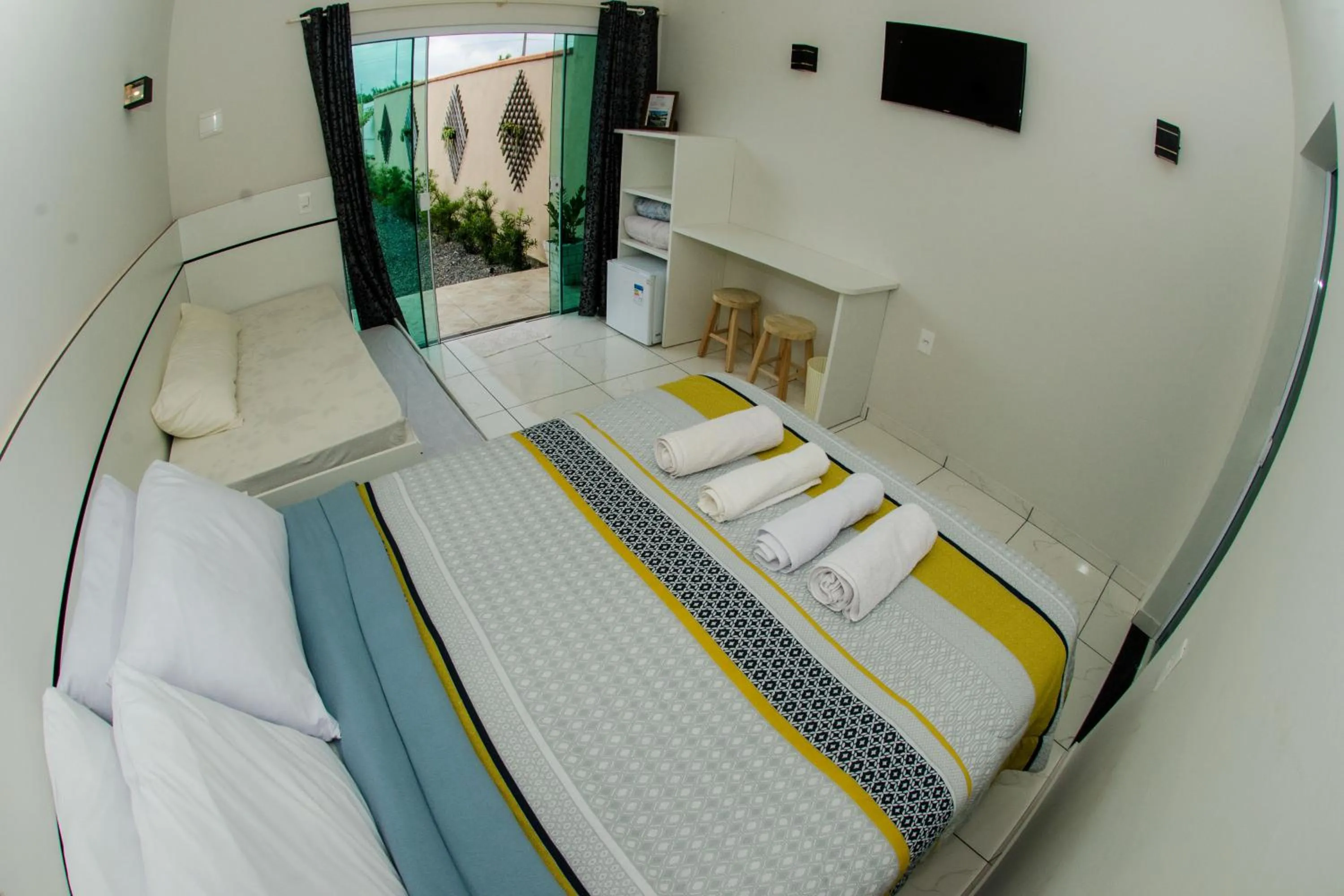 Bed in Marlindo Hospedagem