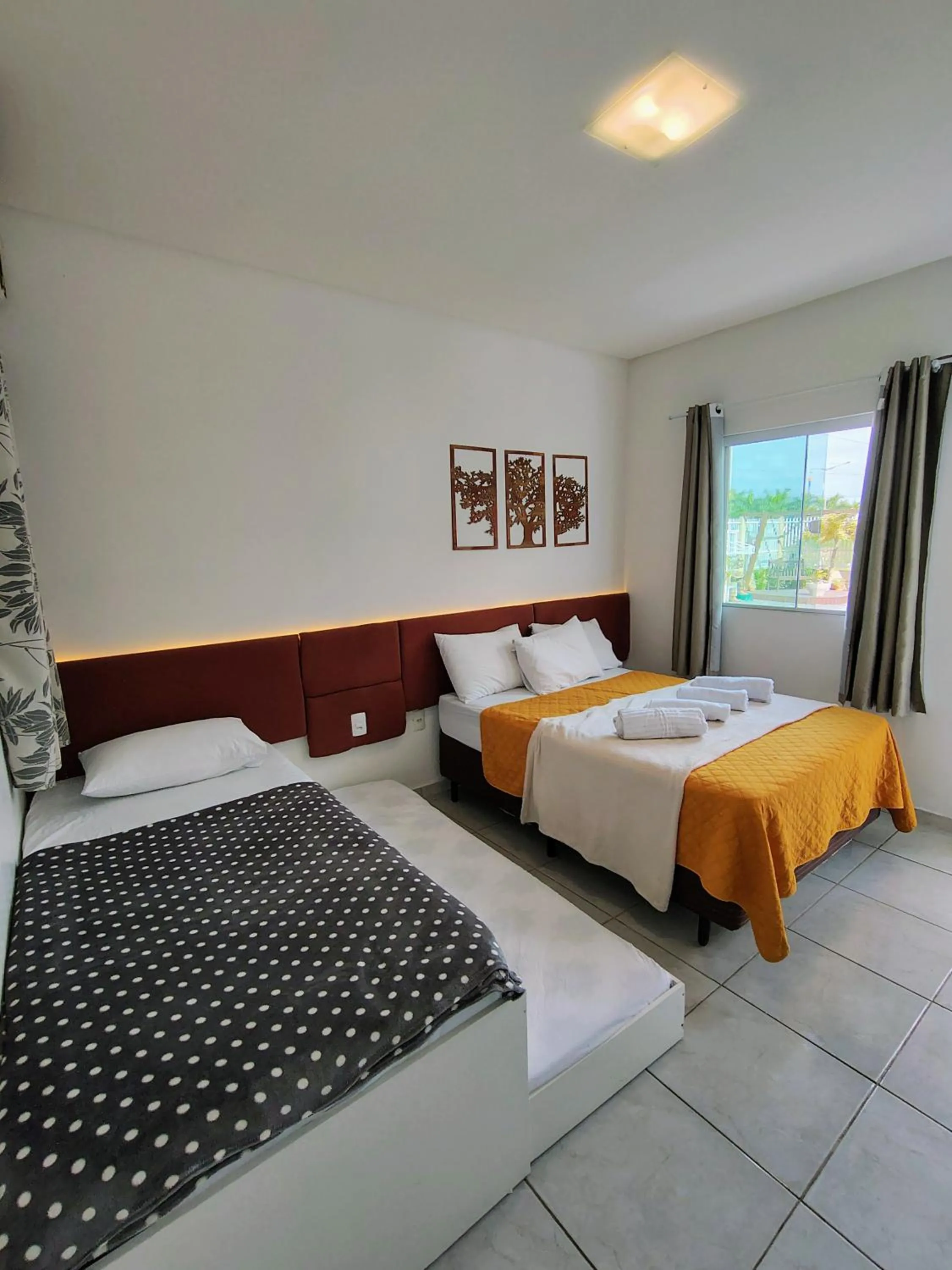 Bed in Marlindo Hospedagem