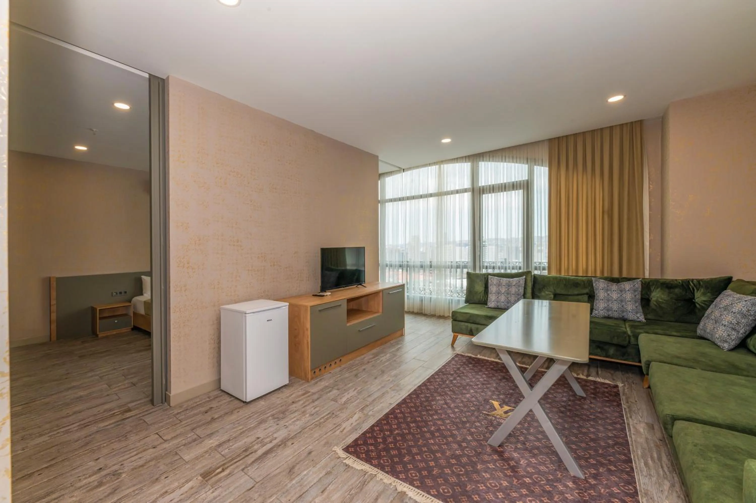 Communal lounge/ TV room in Agora Suites