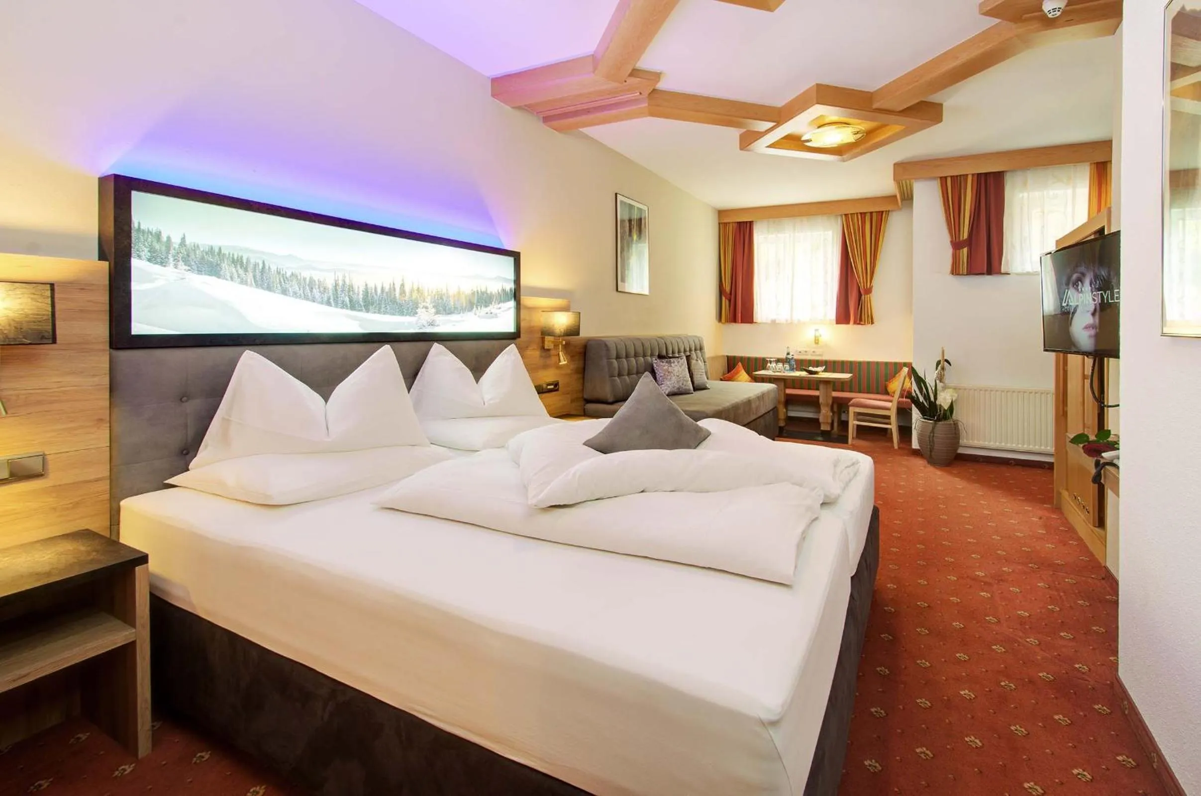 Photo of the whole room, Bed in Alpinstyle Hotel Ischgl