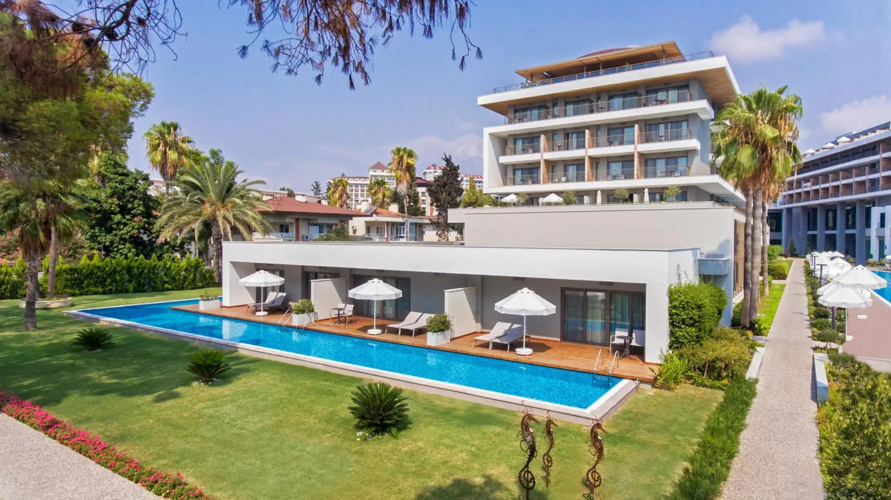 Property building, Swimming Pool in Acanthus & Cennet Barut Collection - Ultra All Inclusive