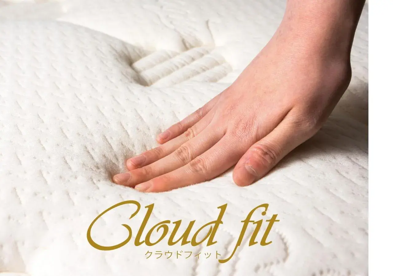 Bed in APA Hotel Joetsu Myoko-Ekimae Bed in APA Hotel Joetsu Myoko-Ekimae