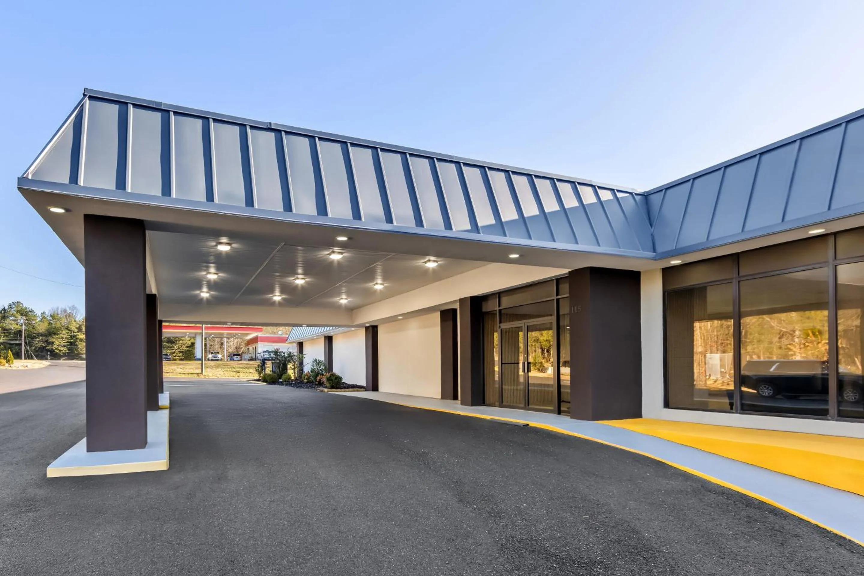 Property building in HomeTowne Studios by Red Roof Athens, TN