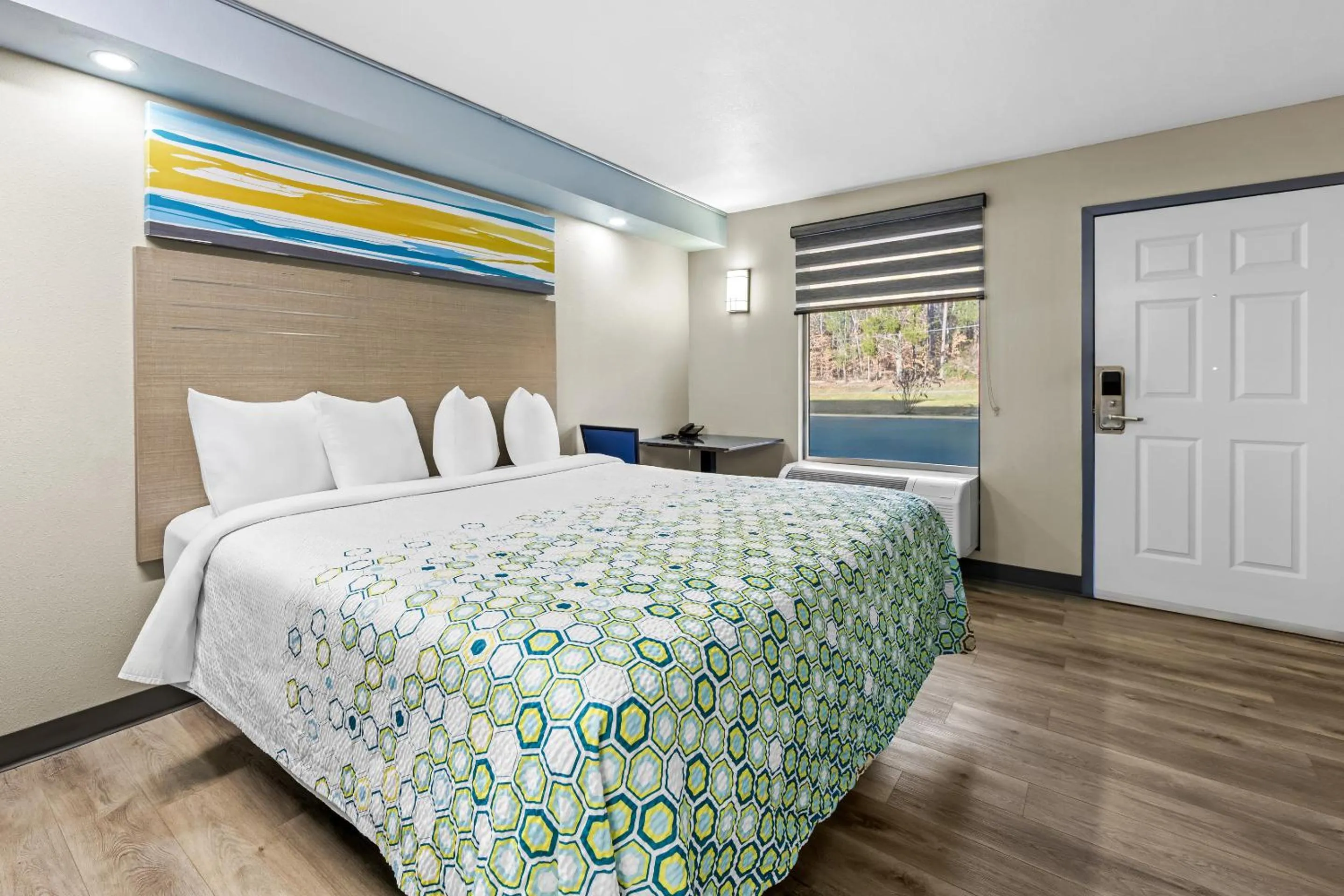 Photo of the whole room, Bed in HomeTowne Studios by Red Roof Athens, TN