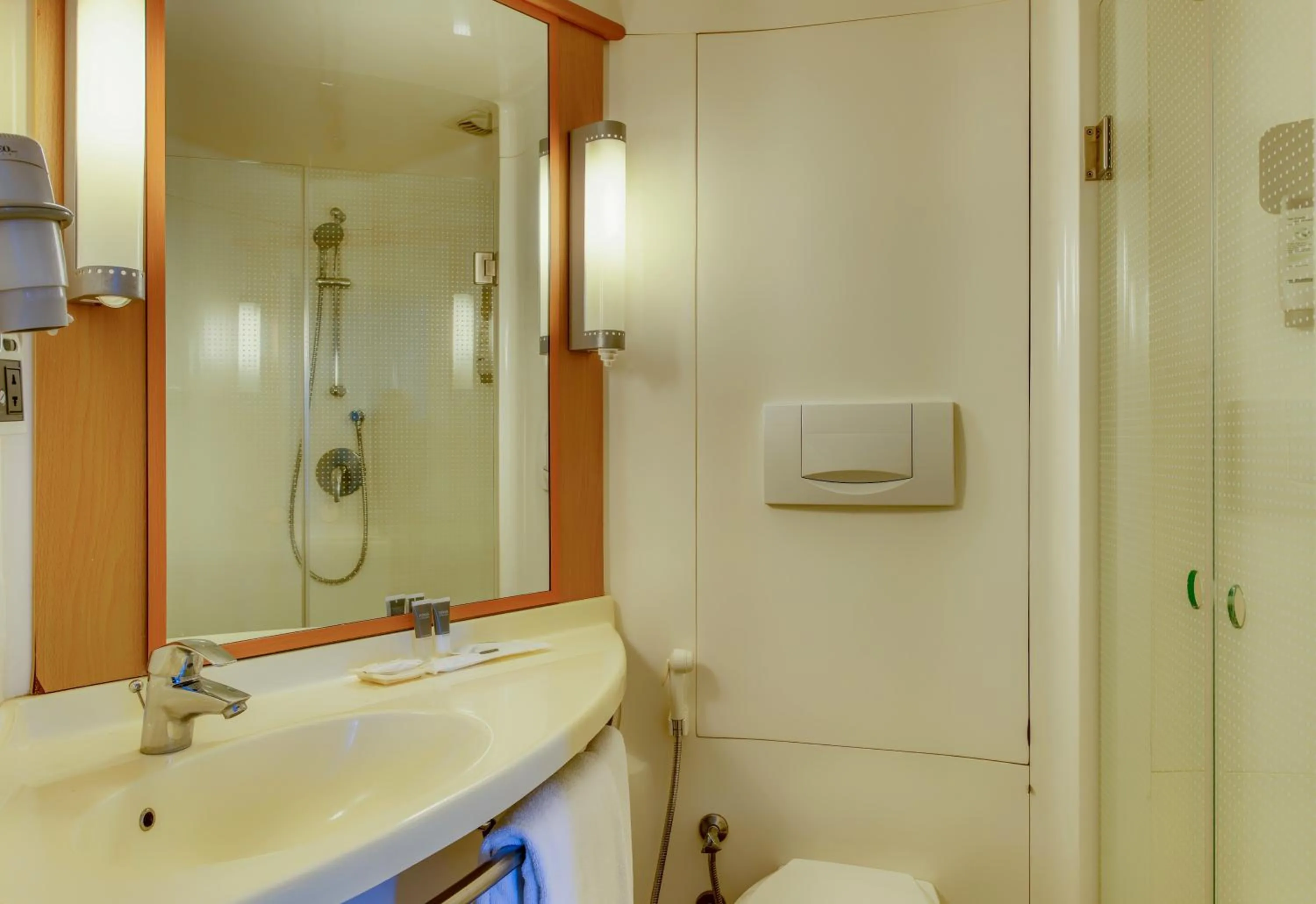 Bathroom in ibis Bengaluru Outer Ring Road