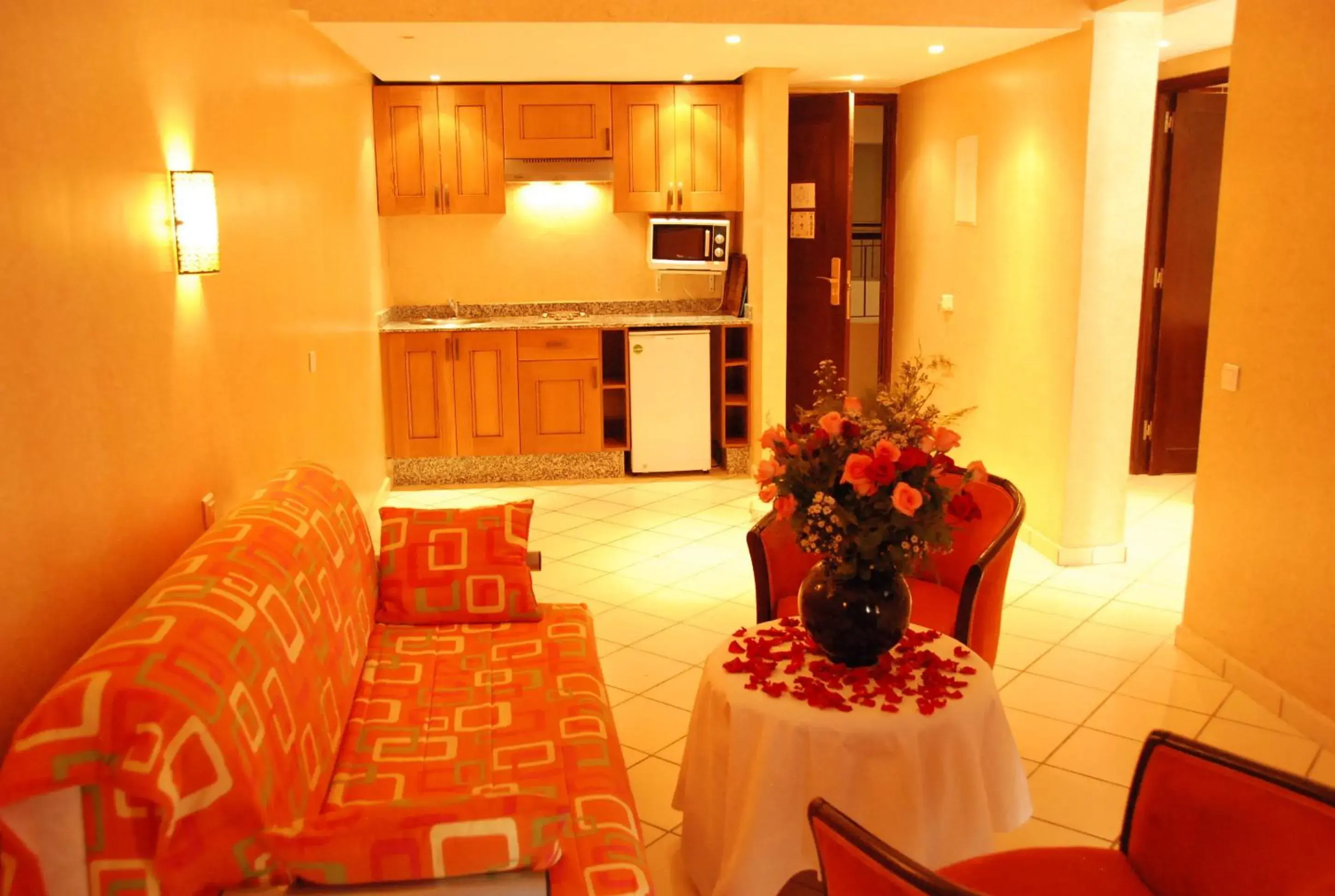 Kitchen or kitchenette in New Farah Hotel