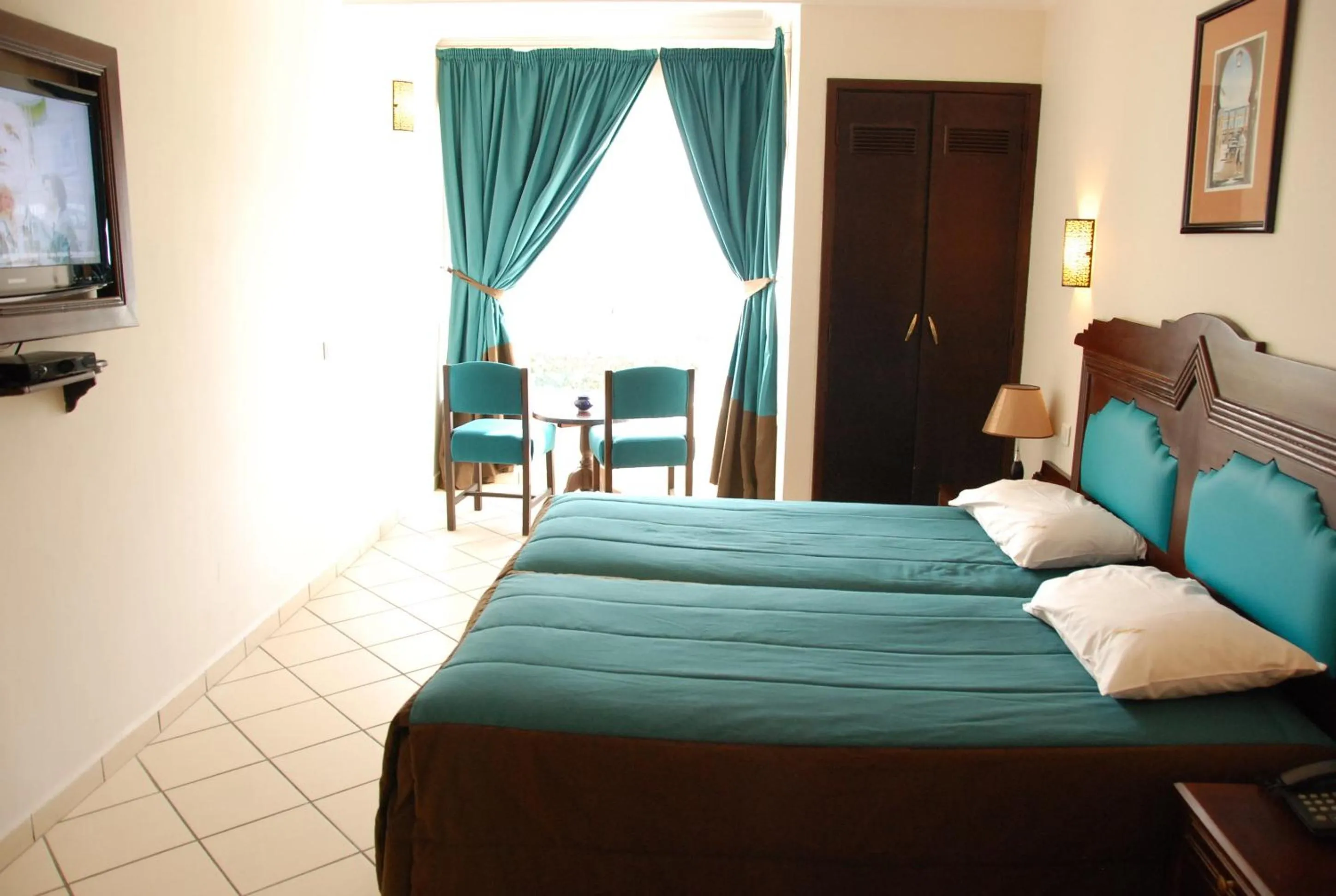 Photo of the whole room in New Farah Hotel