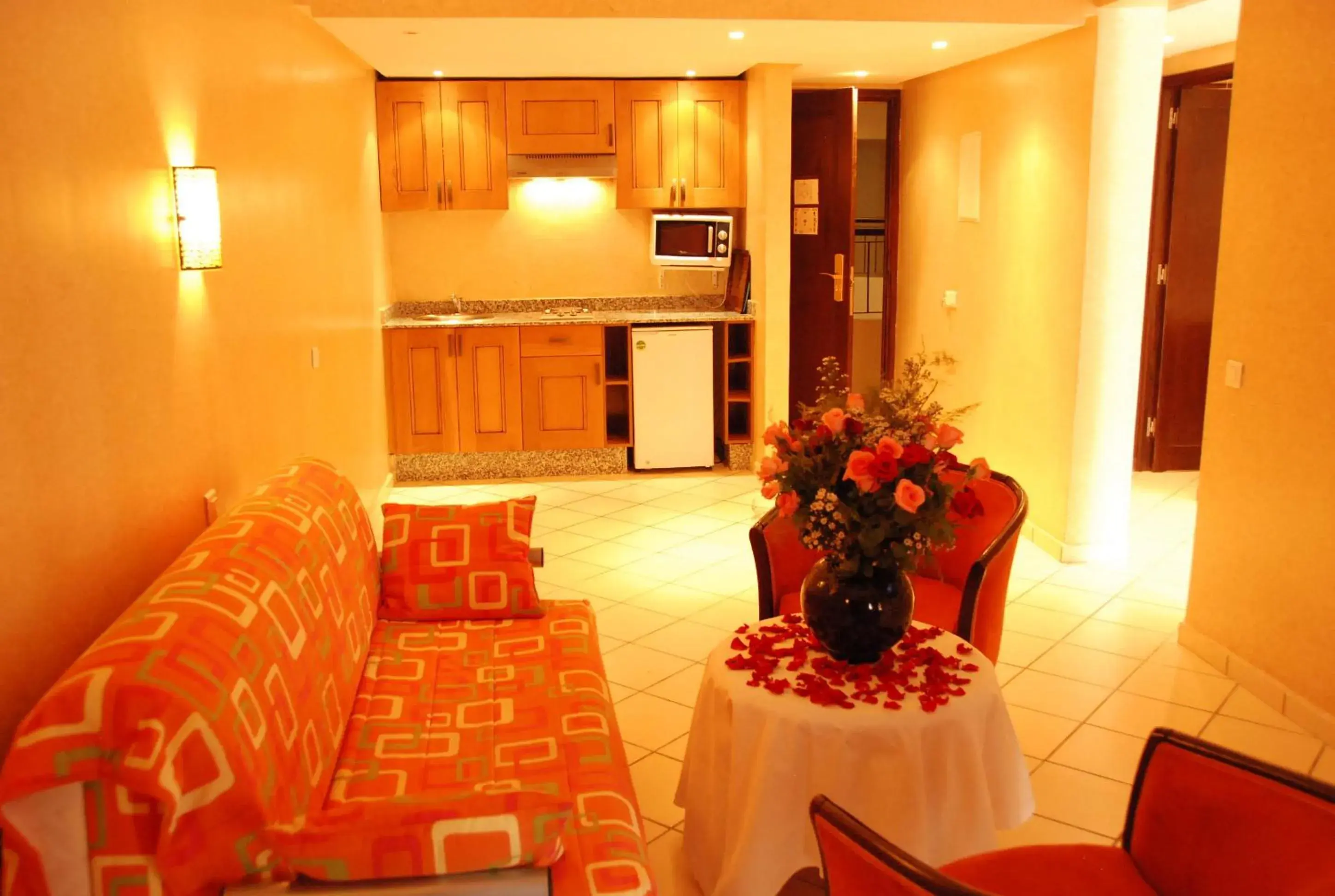 Kitchen or kitchenette in New Farah Hotel